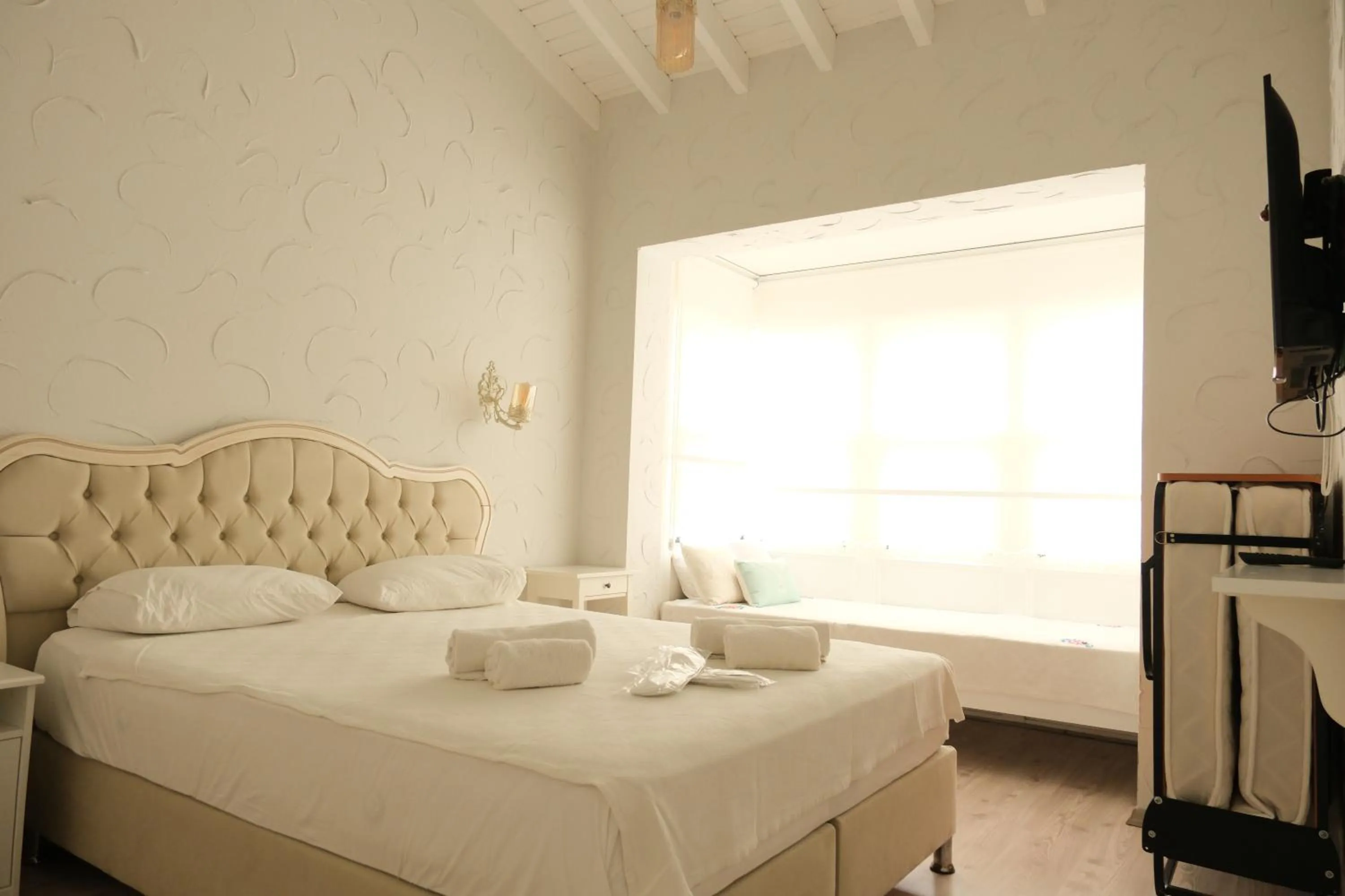 Bed in Kybele Suites Alaçatı