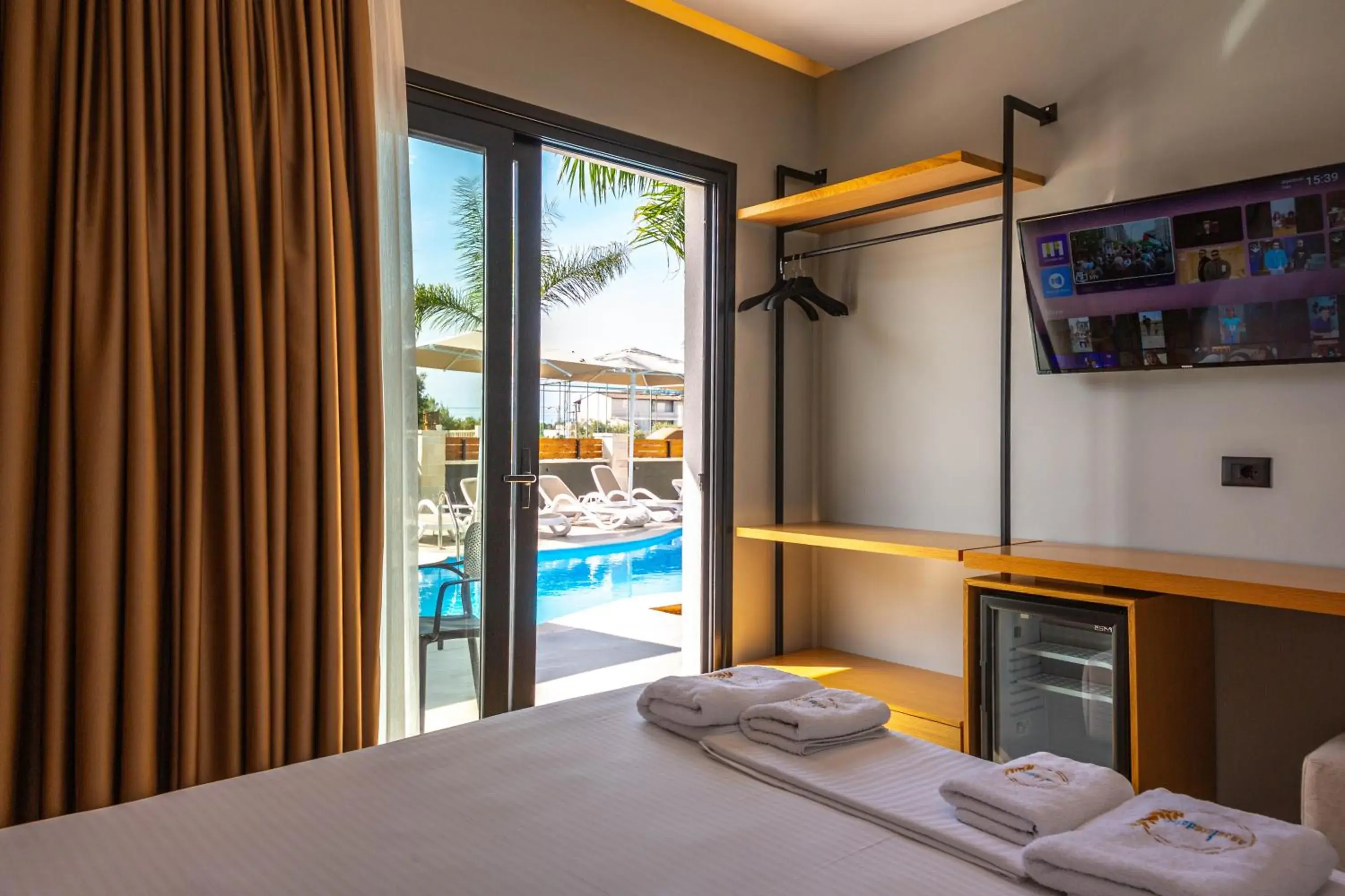 Double Room with Direct Pool Access in Absolute Hotel Ksamil Double Room with Direct Pool Access in Absolute Hotel Ksamil