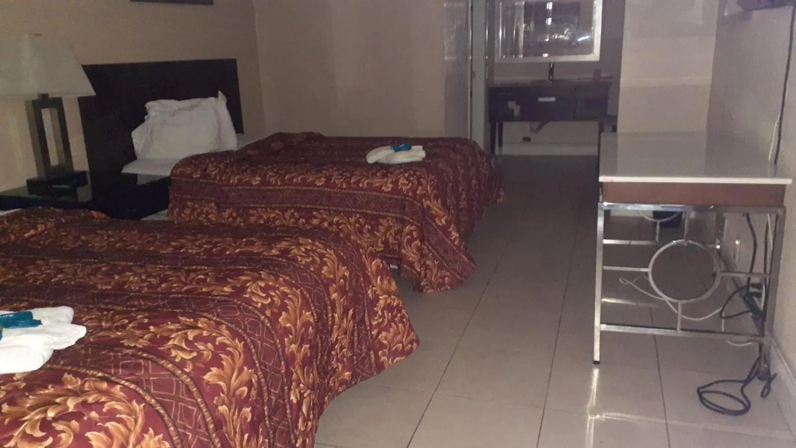 Bed in APM Inn & Suites - Jacksonville