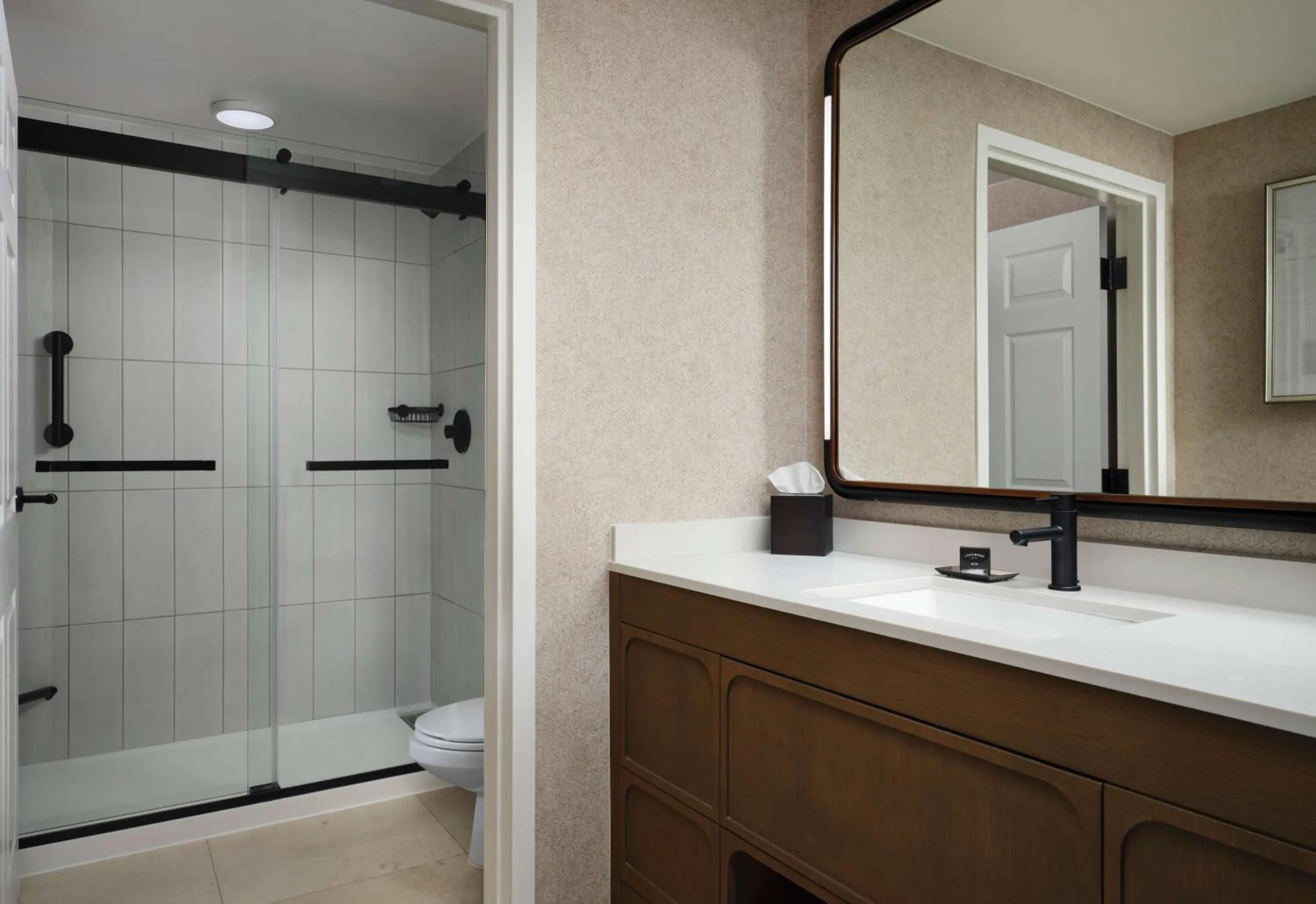 Bathroom in Hotel Flor Tampa Downtown, Tapestry Collection By Hilton