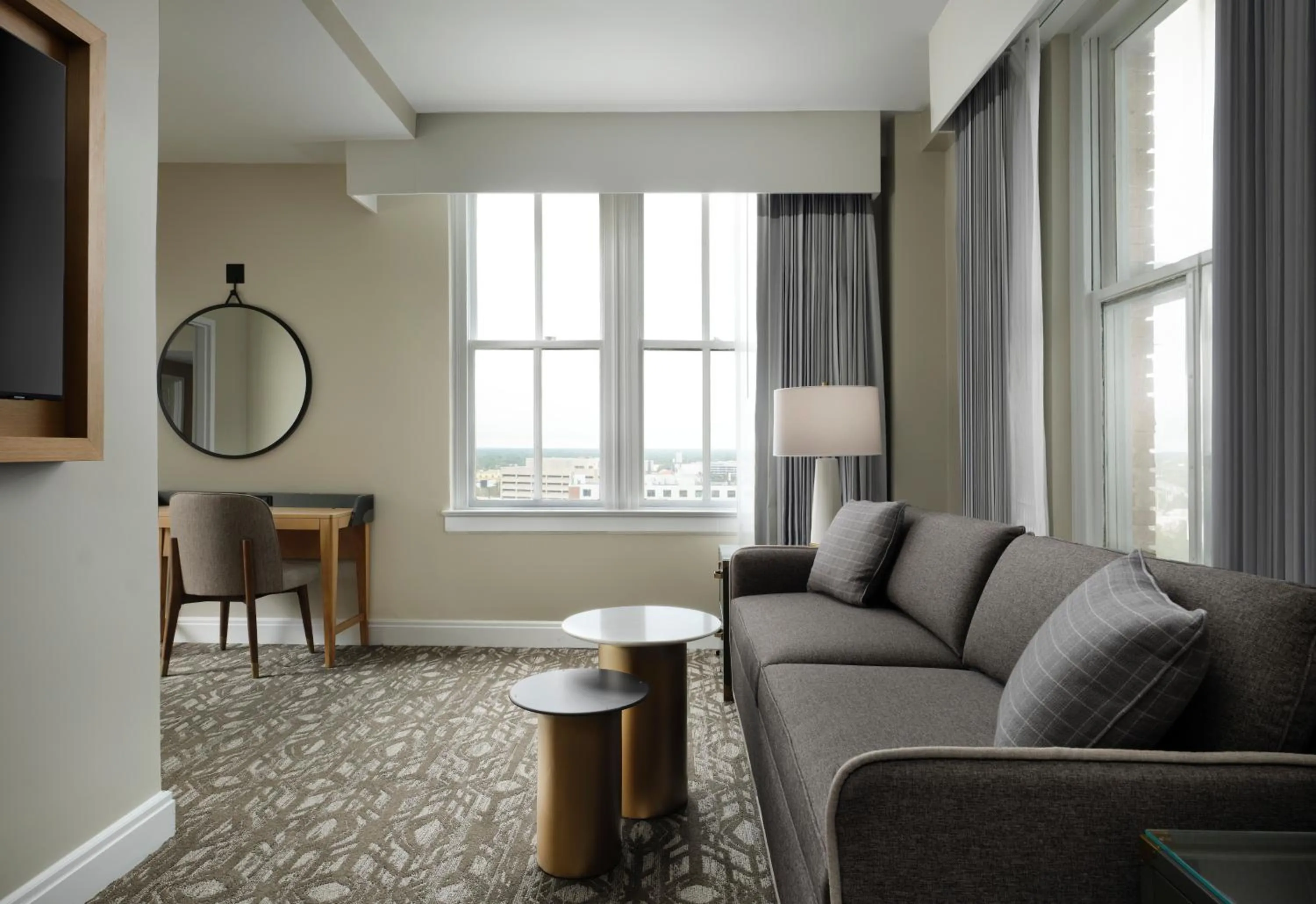 Living room in Hotel Flor Tampa Downtown, Tapestry Collection By Hilton