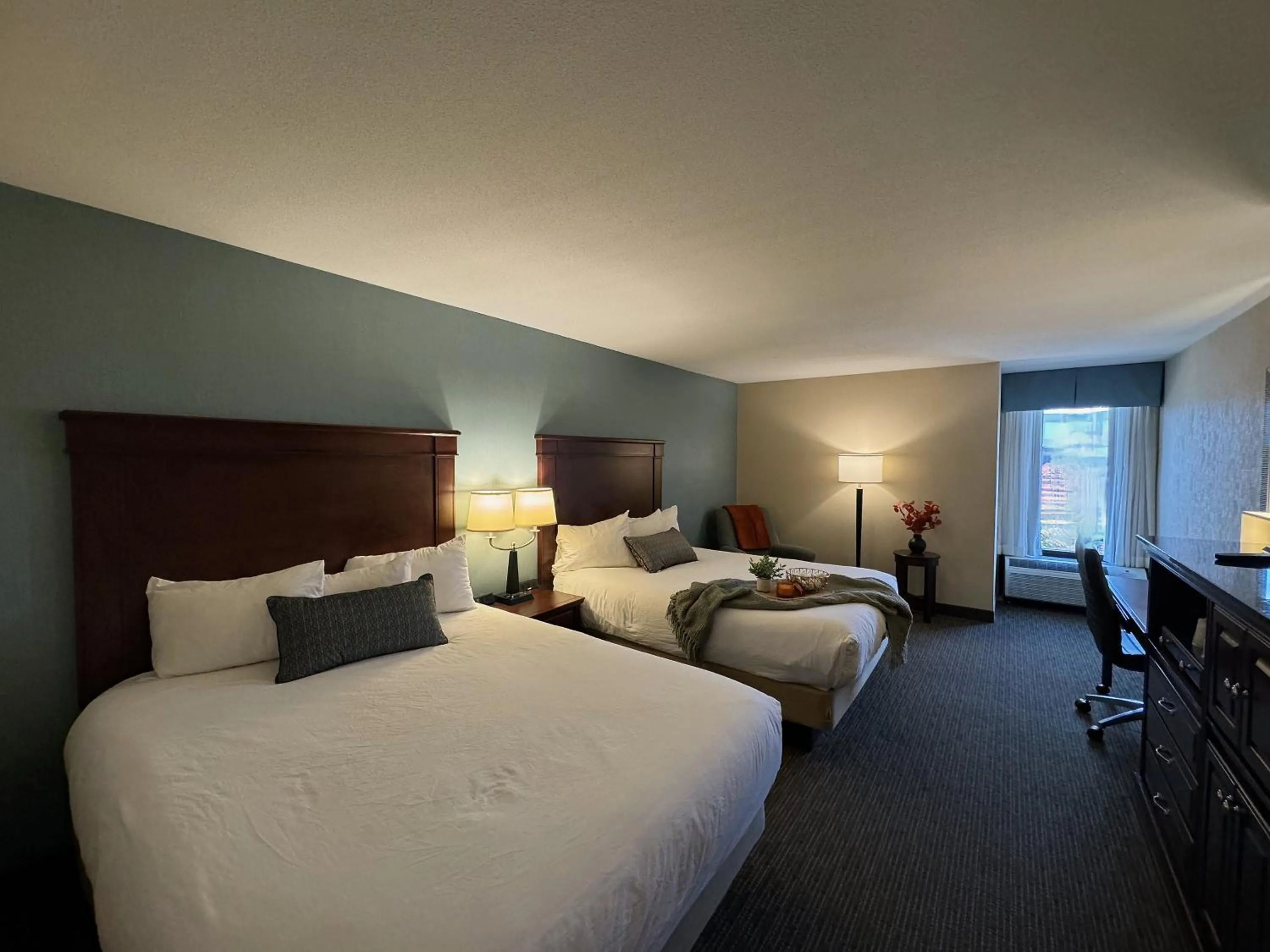 Bed in Troy Inn & Suites