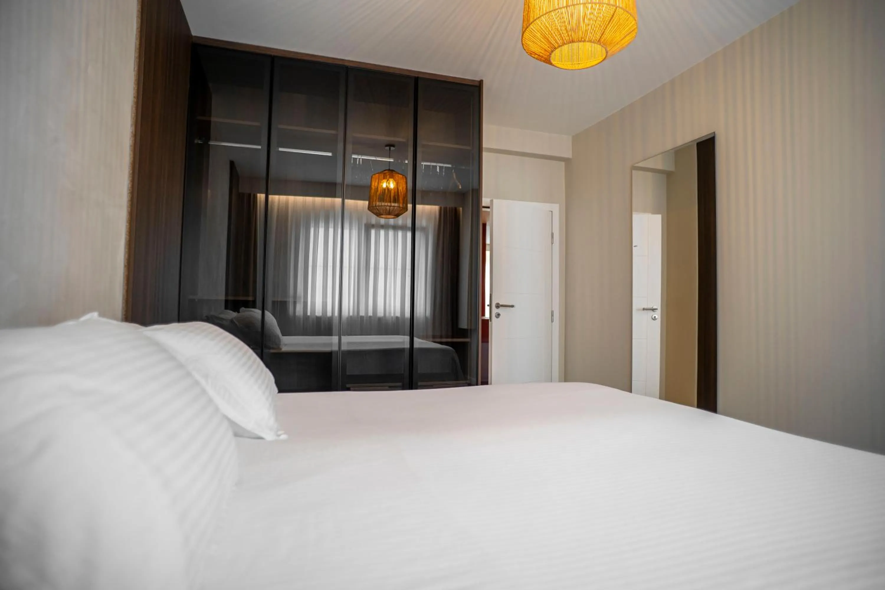 Bed in Lux Apartments