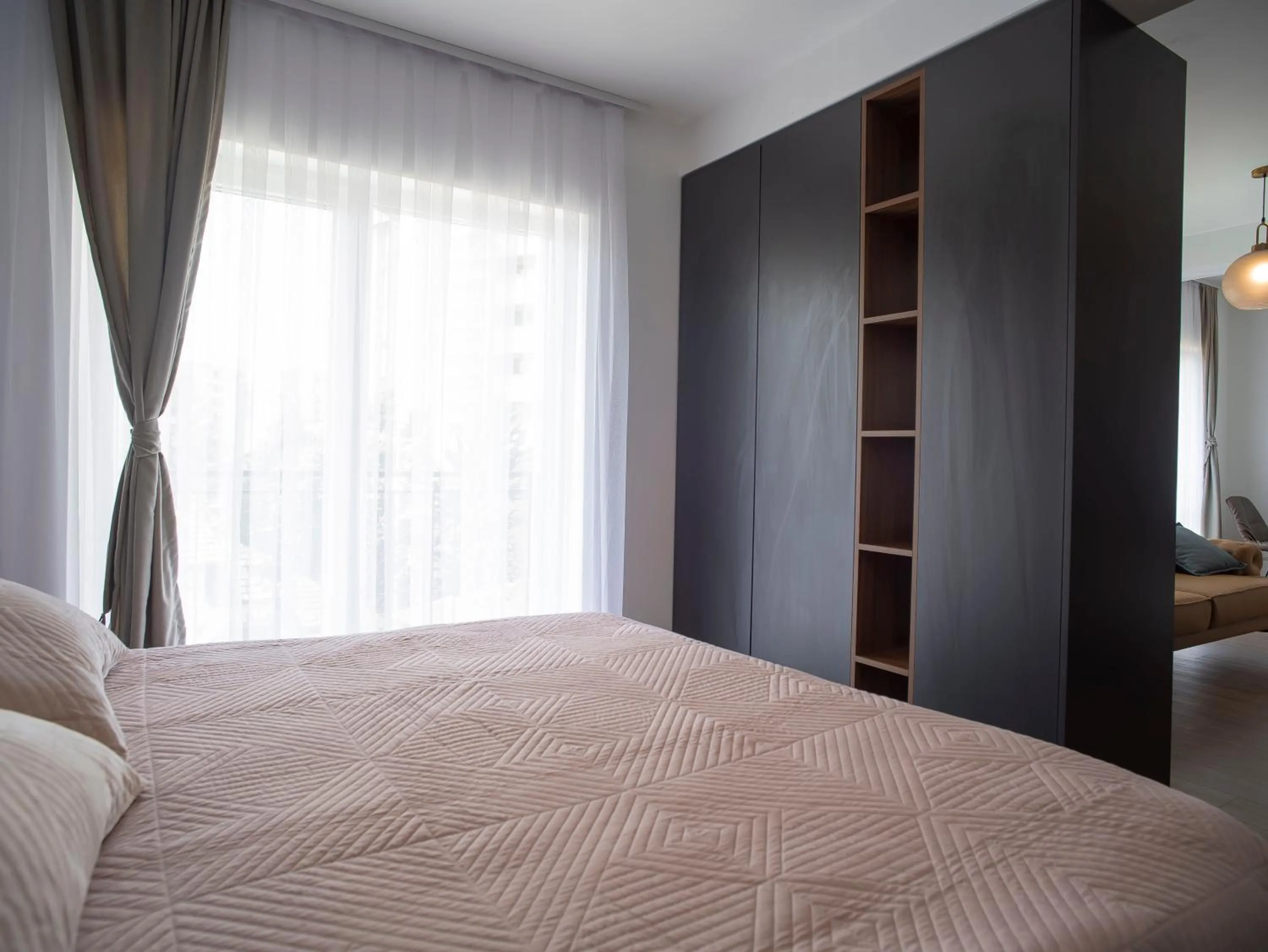 Bed in Lux Apartments