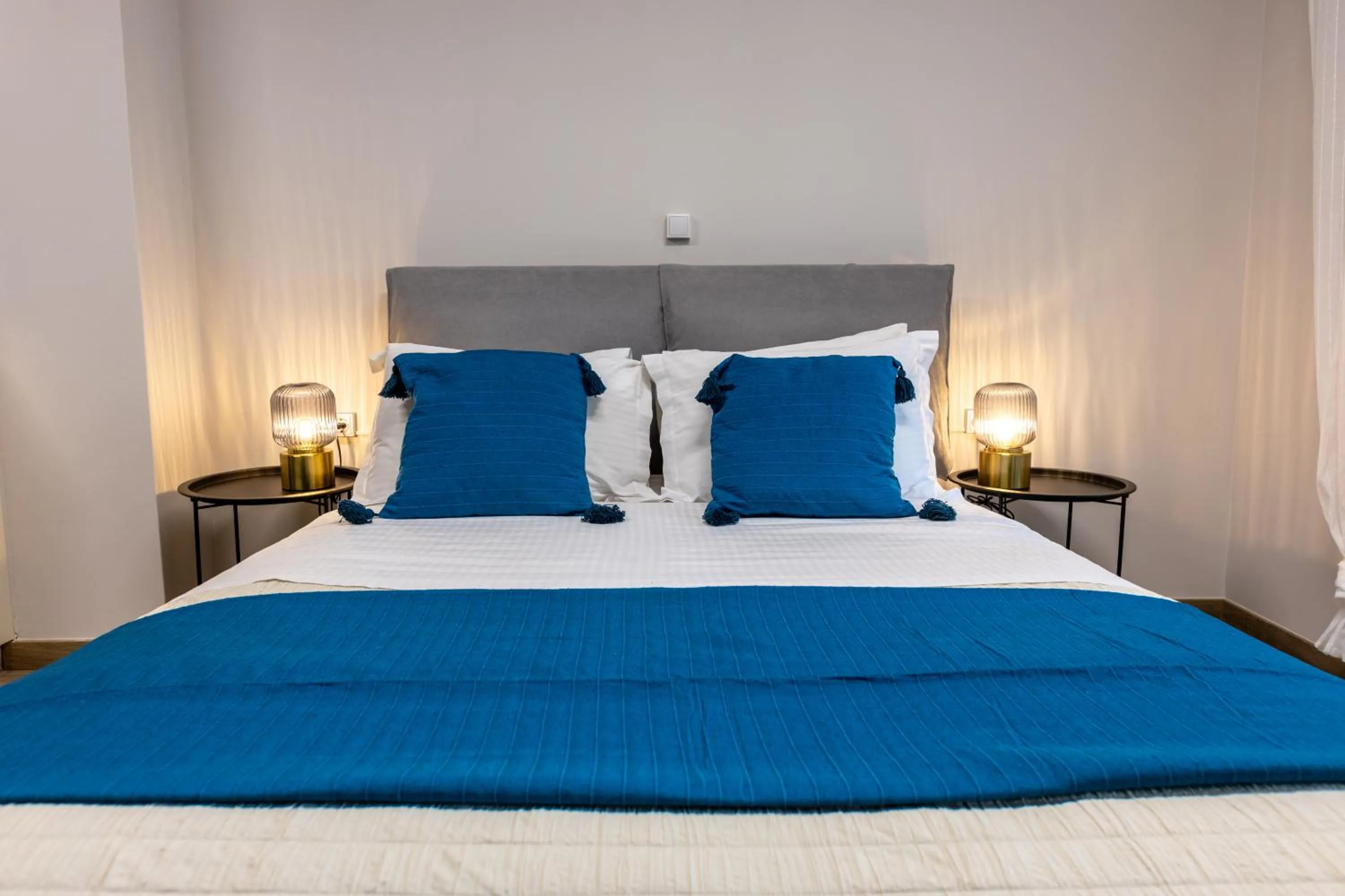 Bed in Athenian Sensations Apartments and Suites in the Heart of Athens