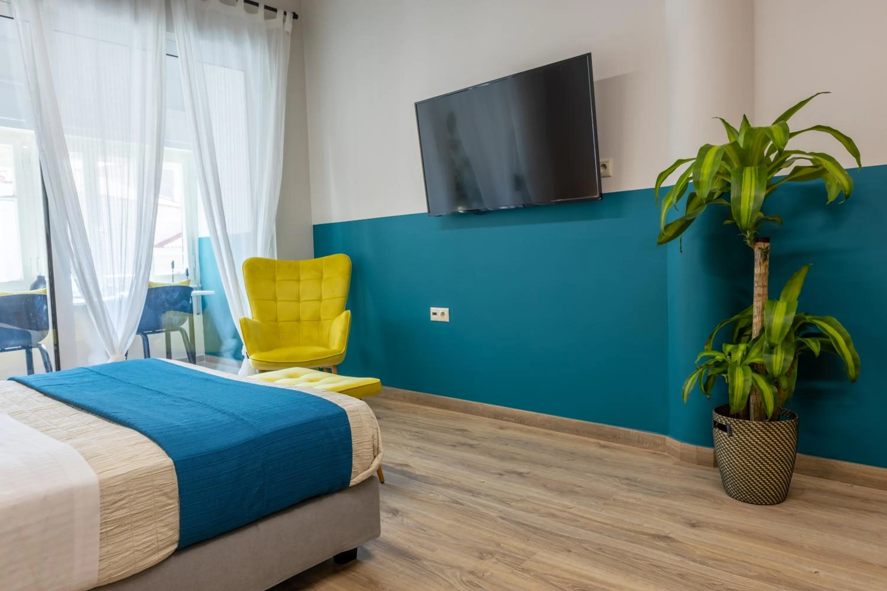 Bed in Athenian Sensations Apartments and Suites in the Heart of Athens