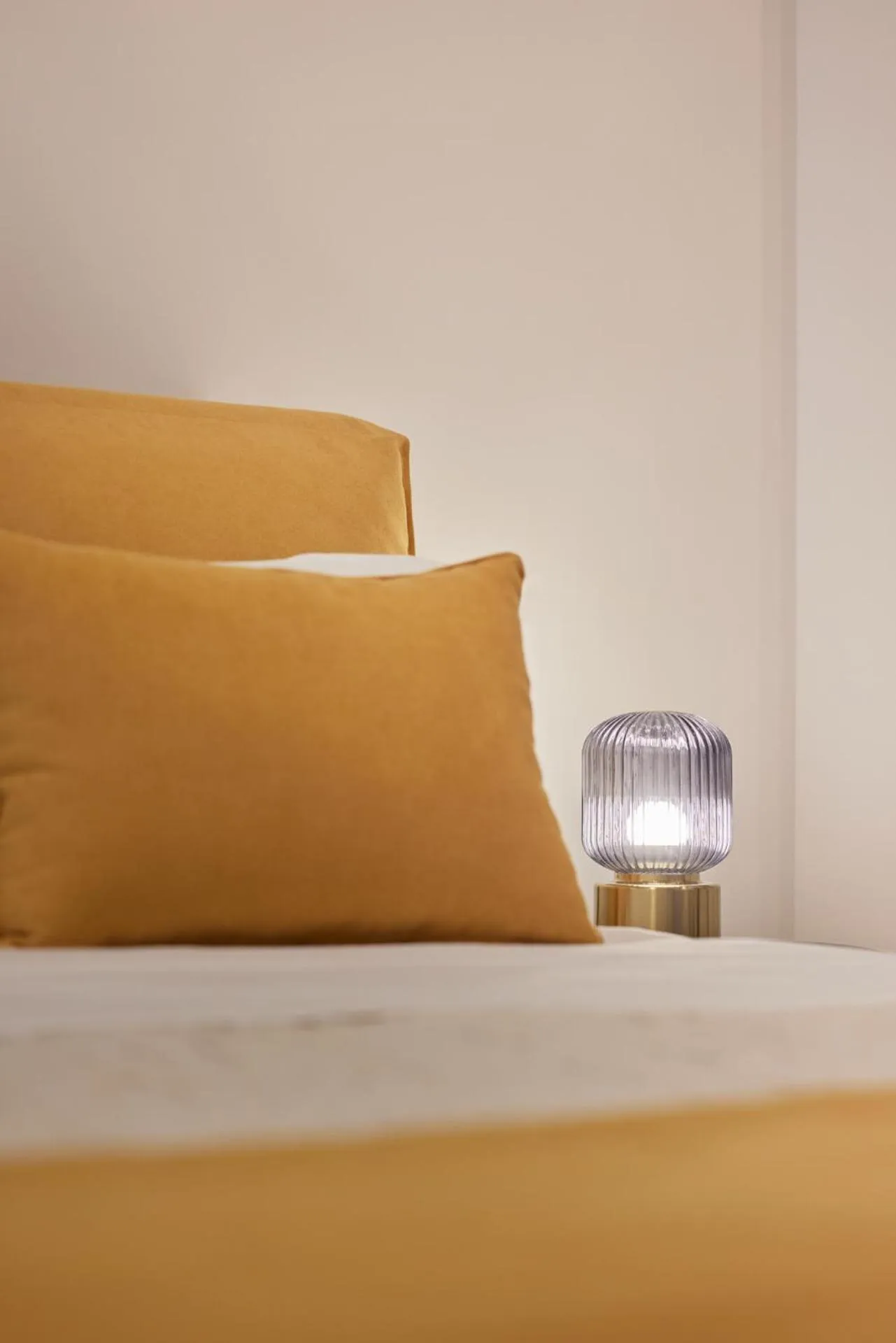 Bed in Athenian Sensations Apartments and Suites in the Heart of Athens