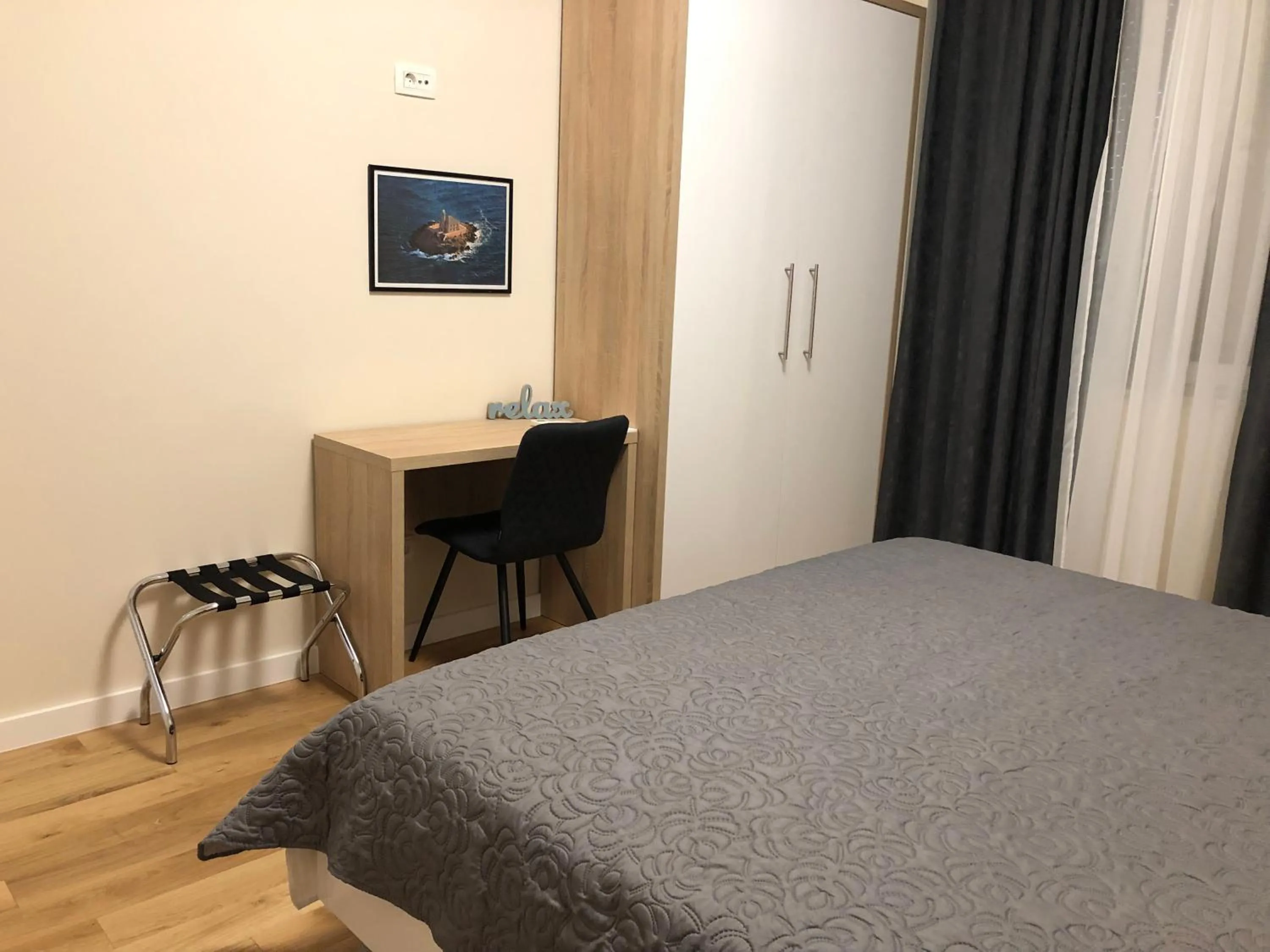 Bed in Tempus Apartment