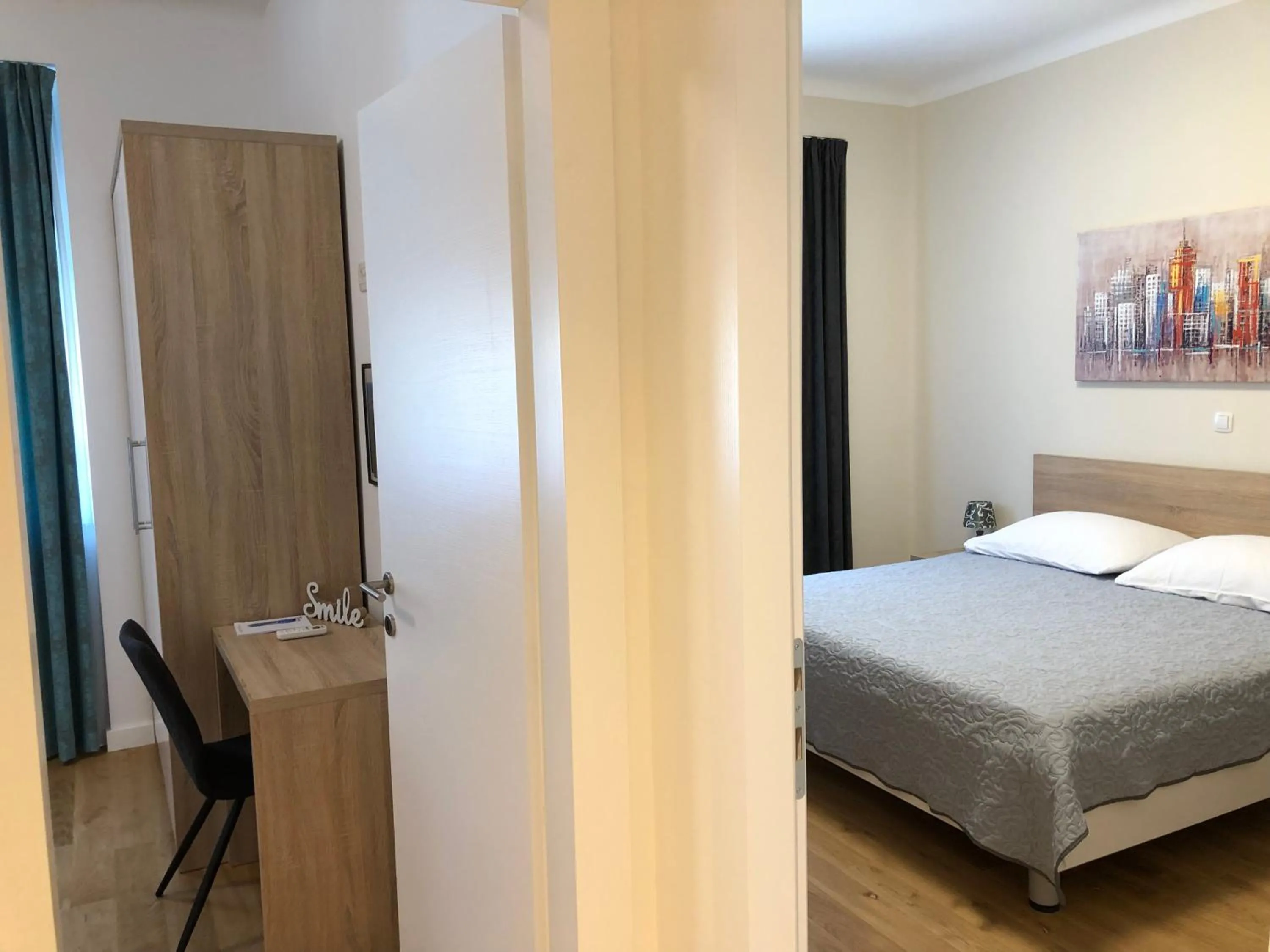 Photo of the whole room, Bed in Tempus Apartment