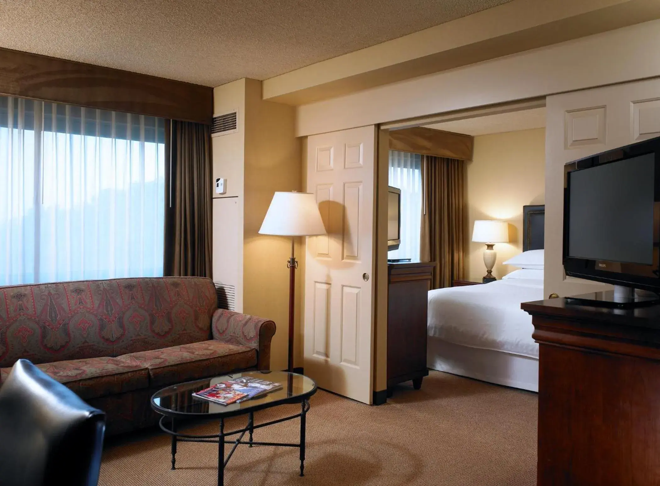 King Room with Sofa Bed and Adapted Tub - Mobility and Hearing Accessible in Sheraton Fairplex Suites & Conference Center King Room with Sofa Bed and Adapted Tub - Mobility and Hearing Accessible in Sheraton Fairplex Suites & Conference Center