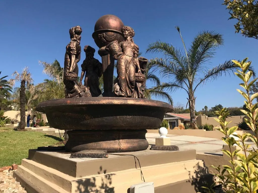 Property logo or sign in The Afropolitan