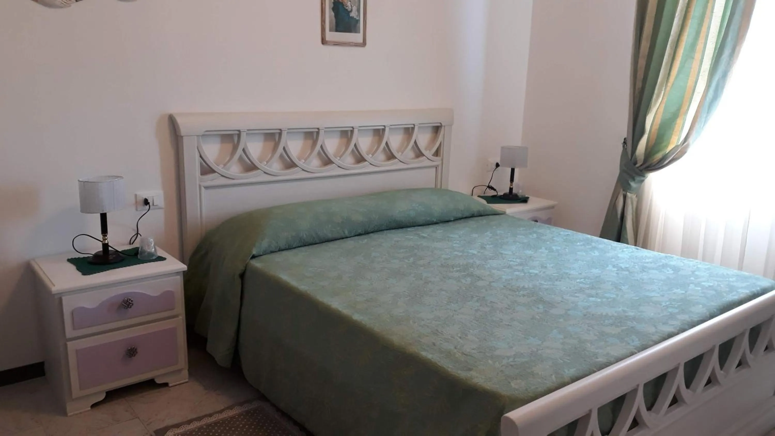 Bed in Hotel La Barcarola