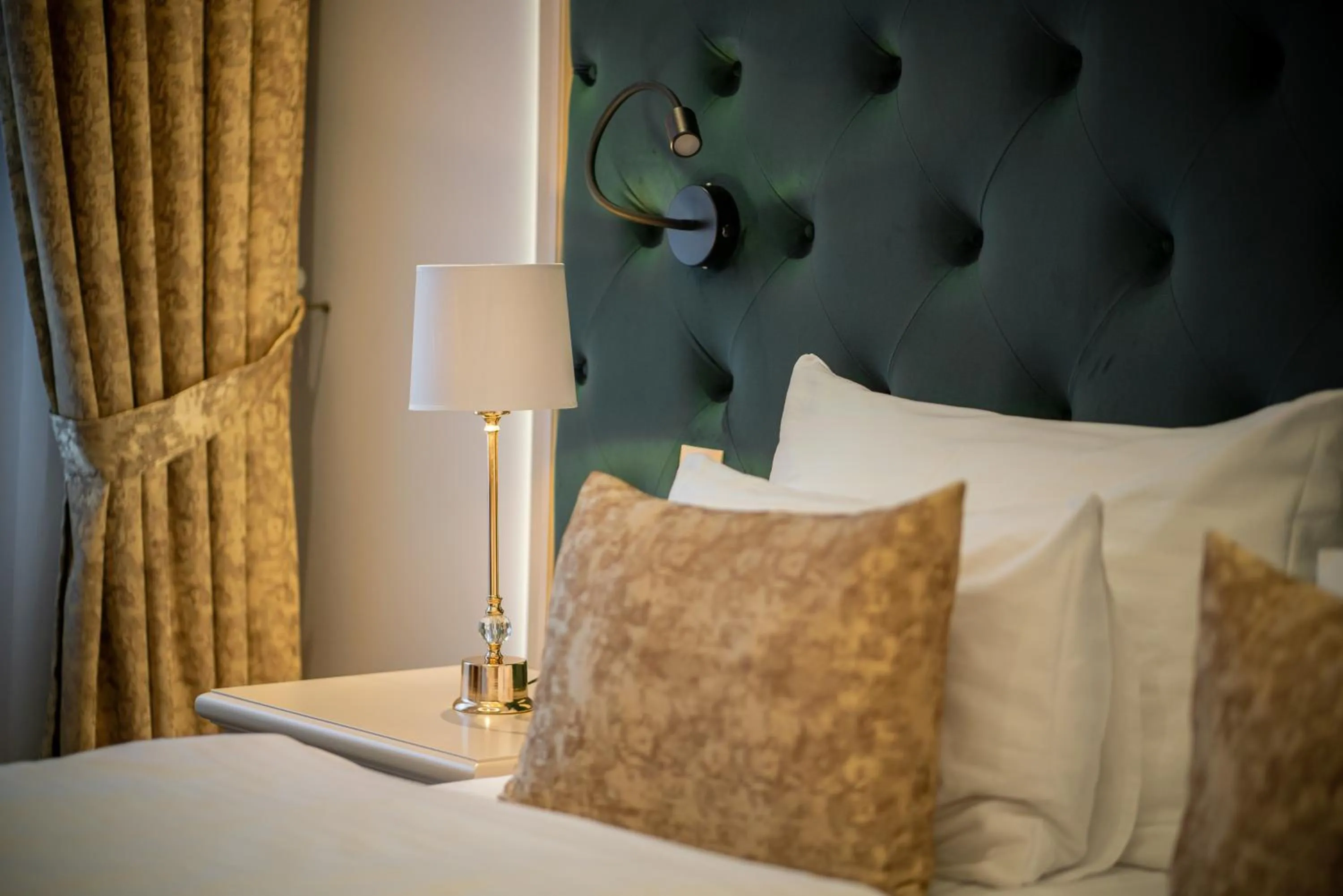 Decorative detail, Bed in Golden Key Boutique Hotel