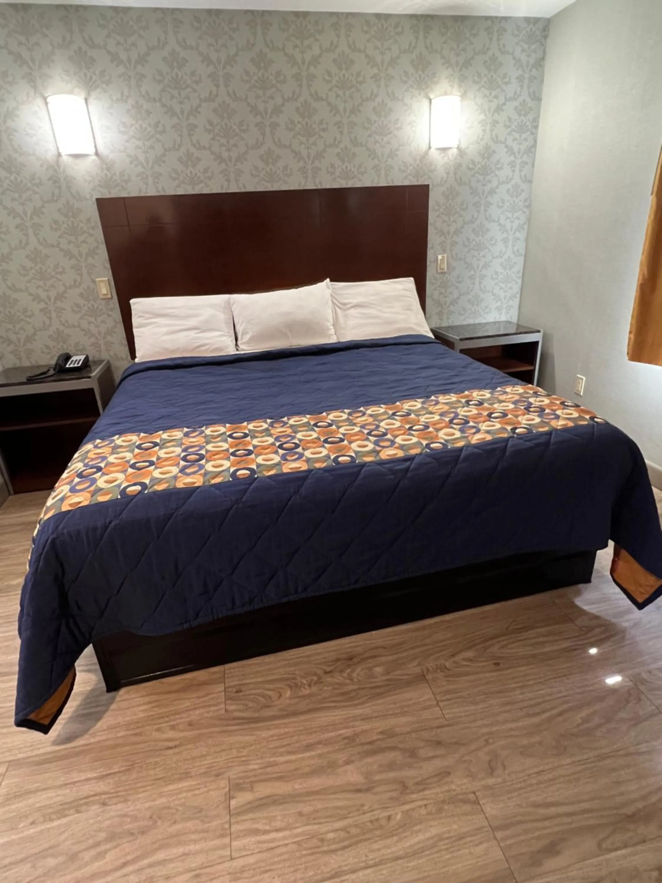 Bed in Atlantic Motor Inn