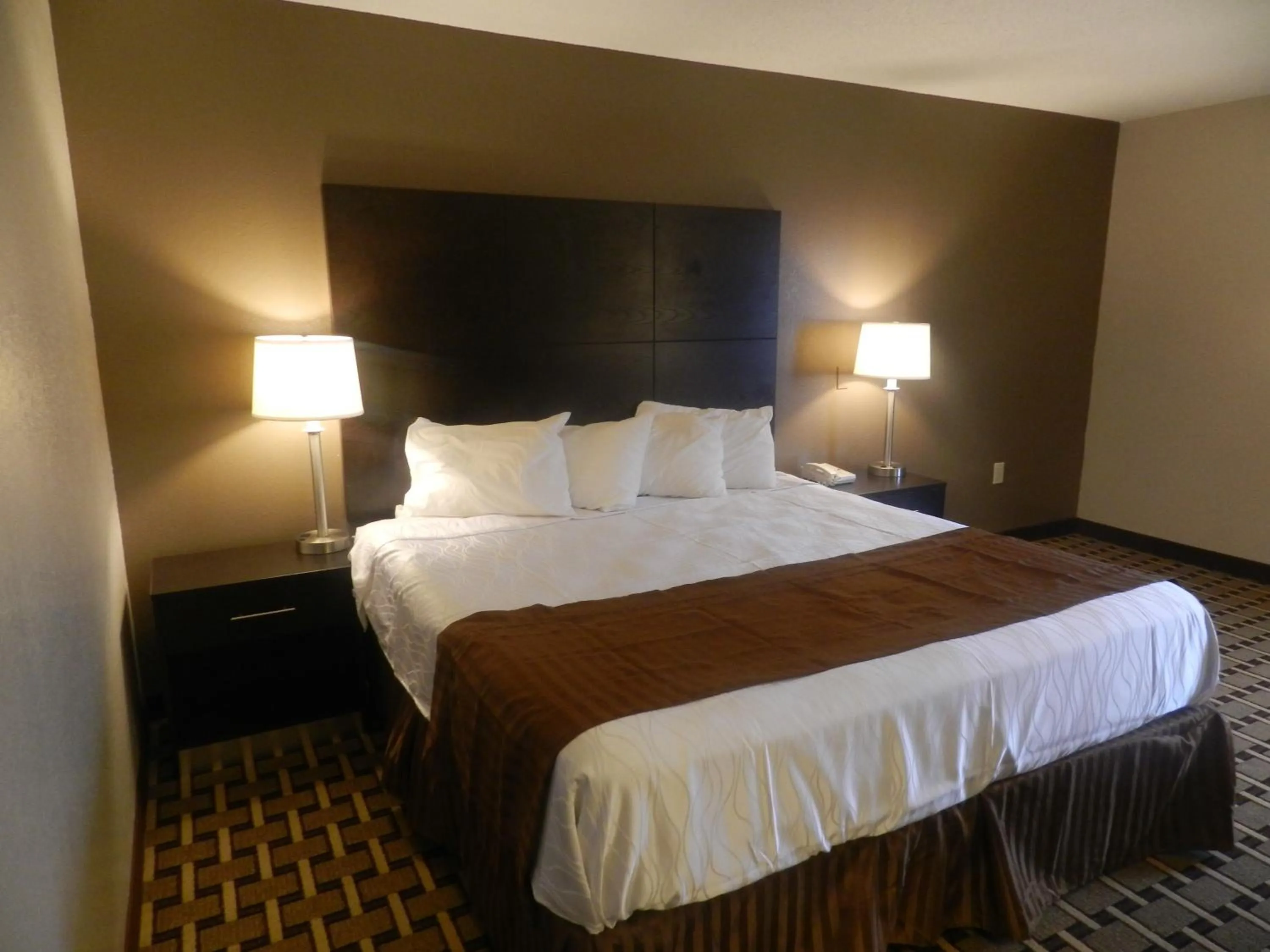 Bed in Haven Inn & Suites