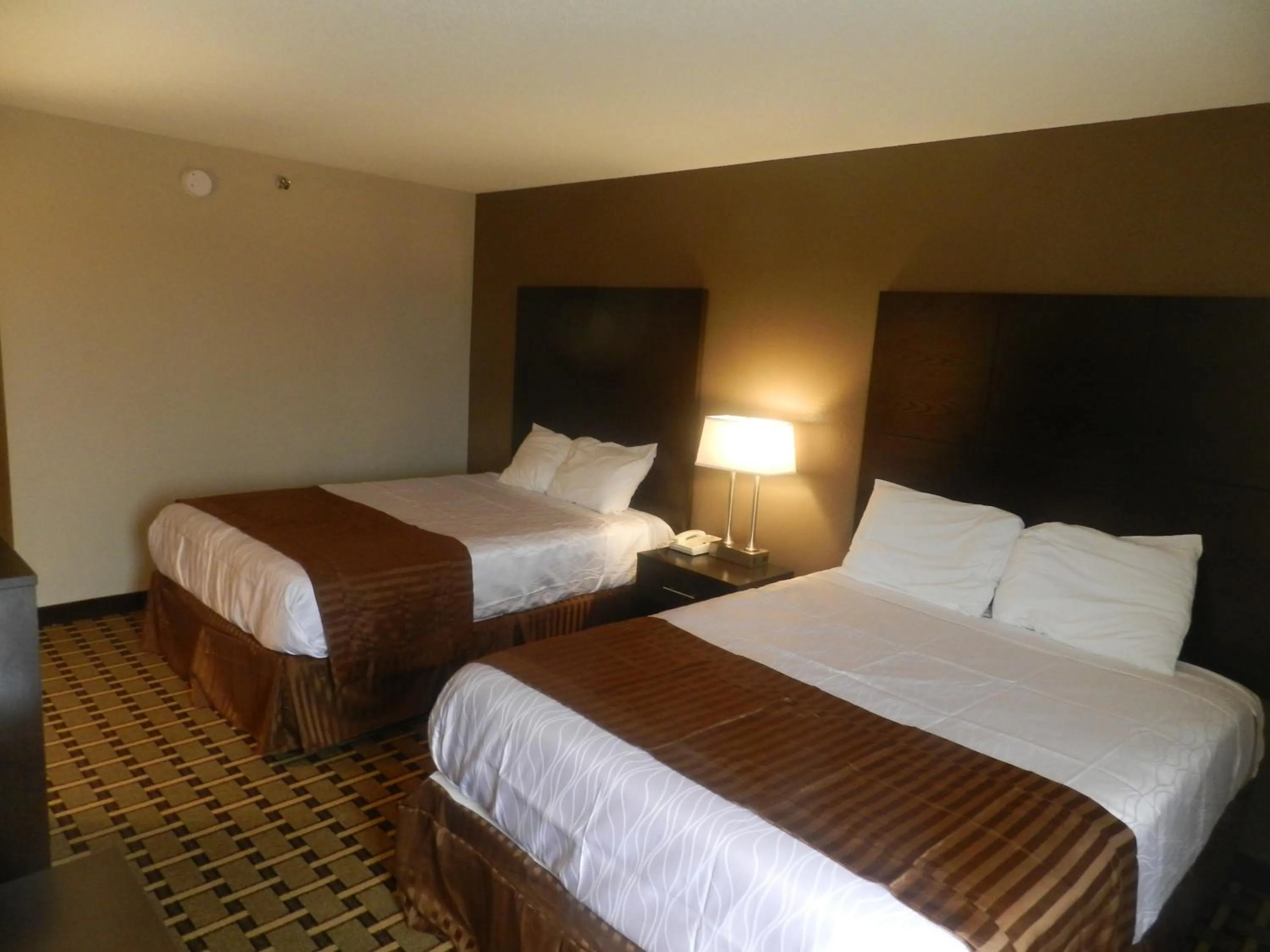 Bed in Haven Inn & Suites