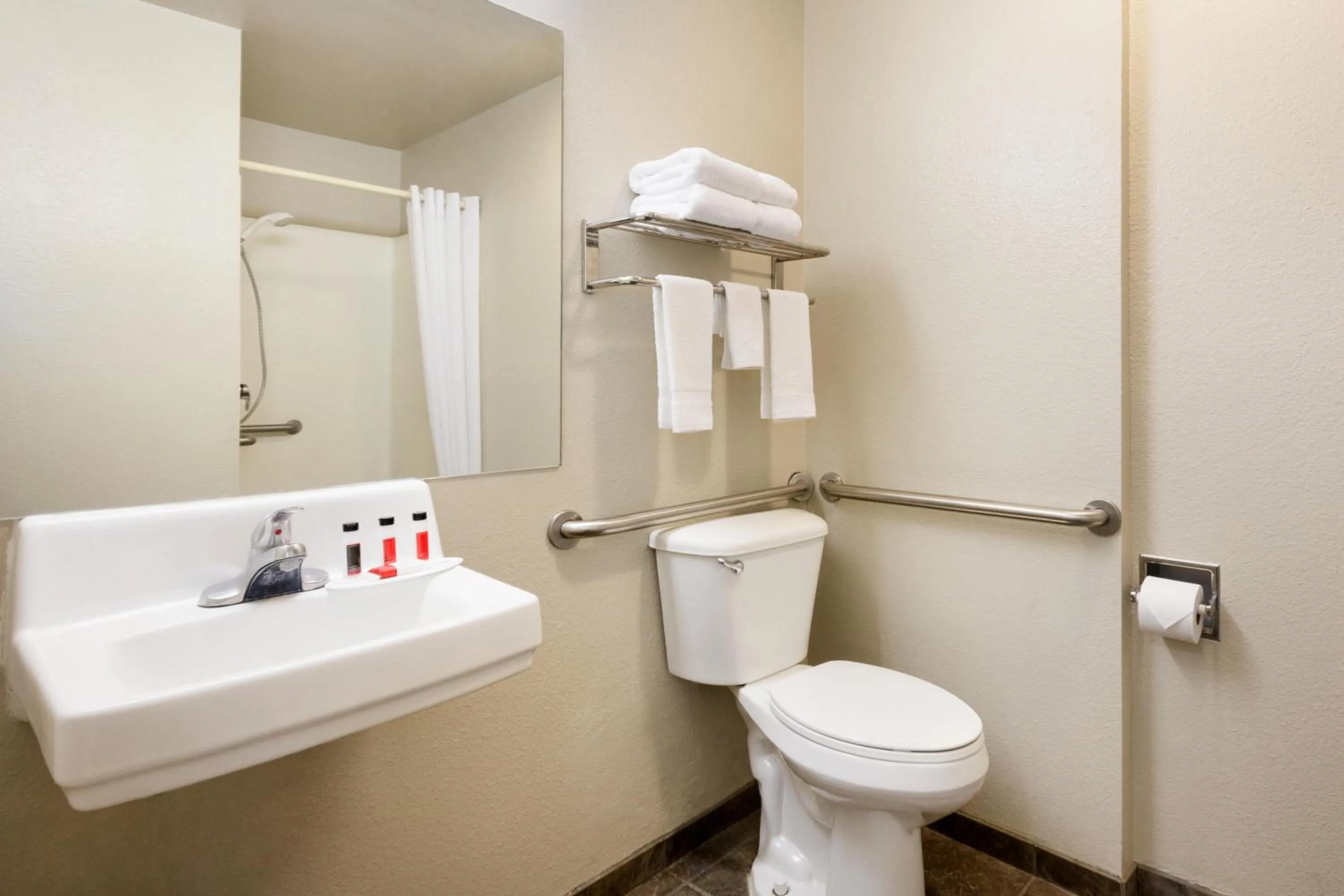 Toilet in Travelodge by Wyndham Alpine