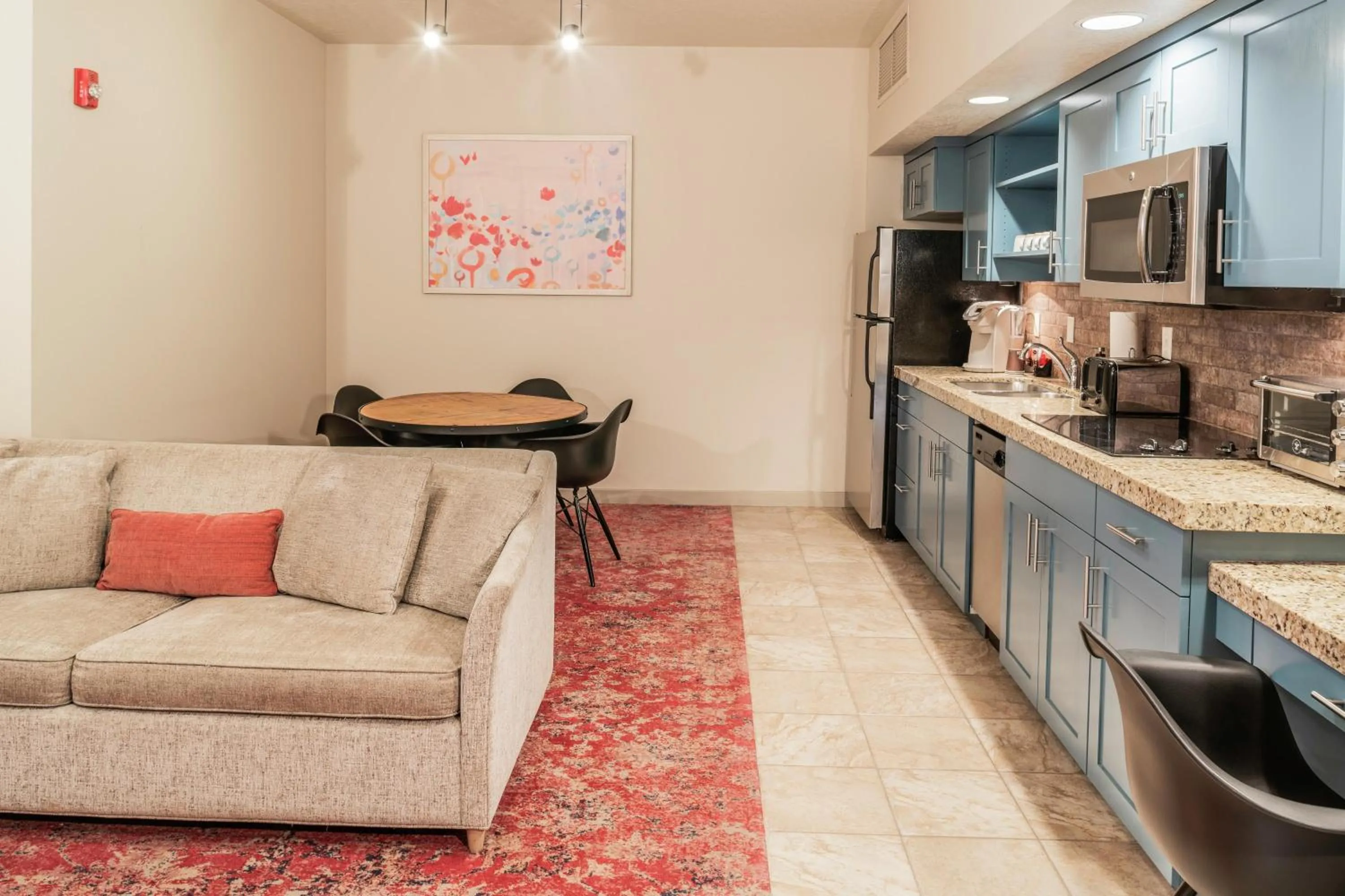 Living room in Cliffrose Springdale, Curio Collection By Hilton