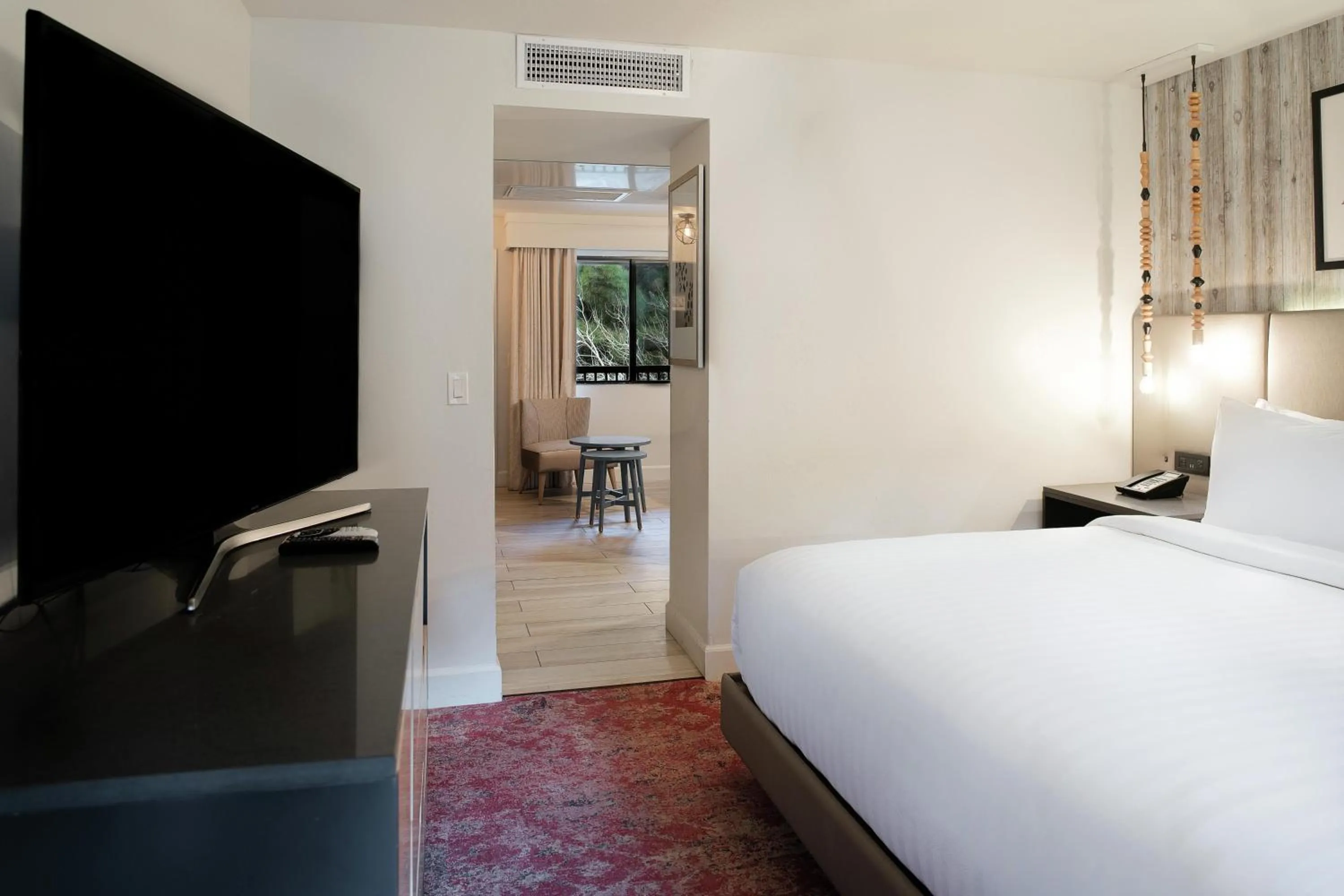 Bed in Cliffrose Springdale, Curio Collection By Hilton