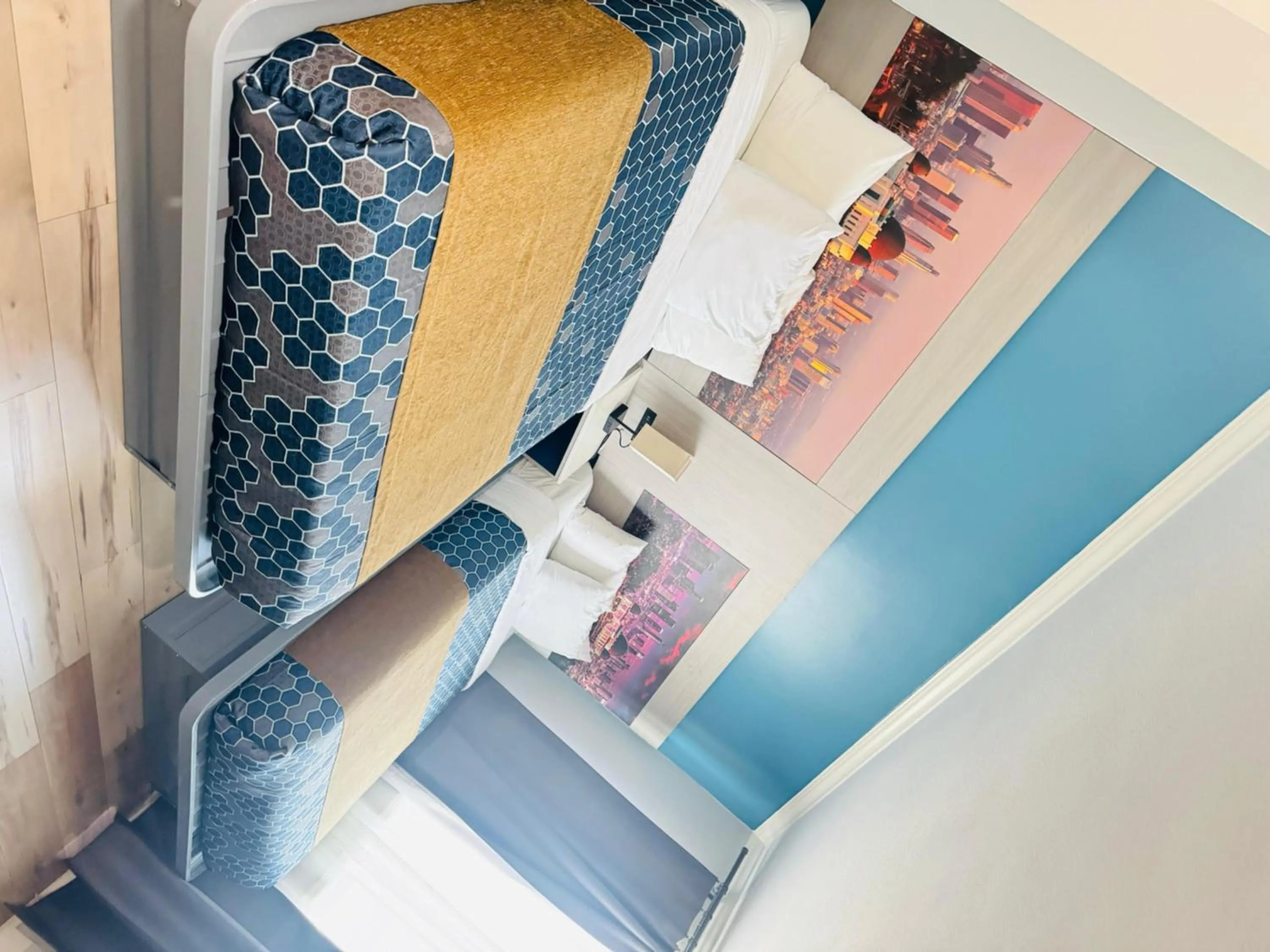 Bed in Hometel Suites