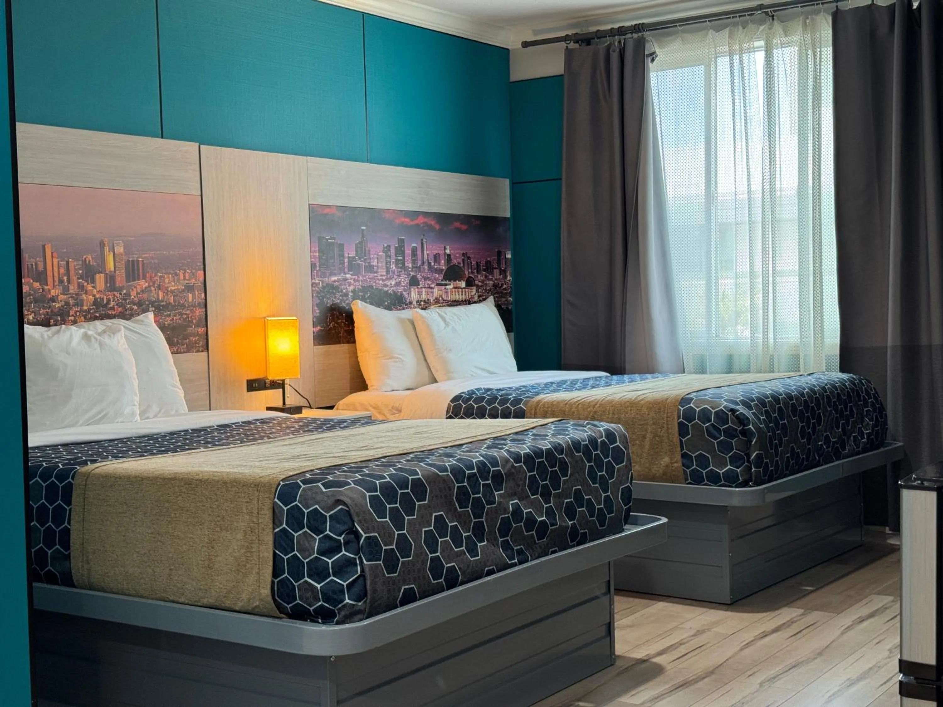 Bed in Hometel Suites