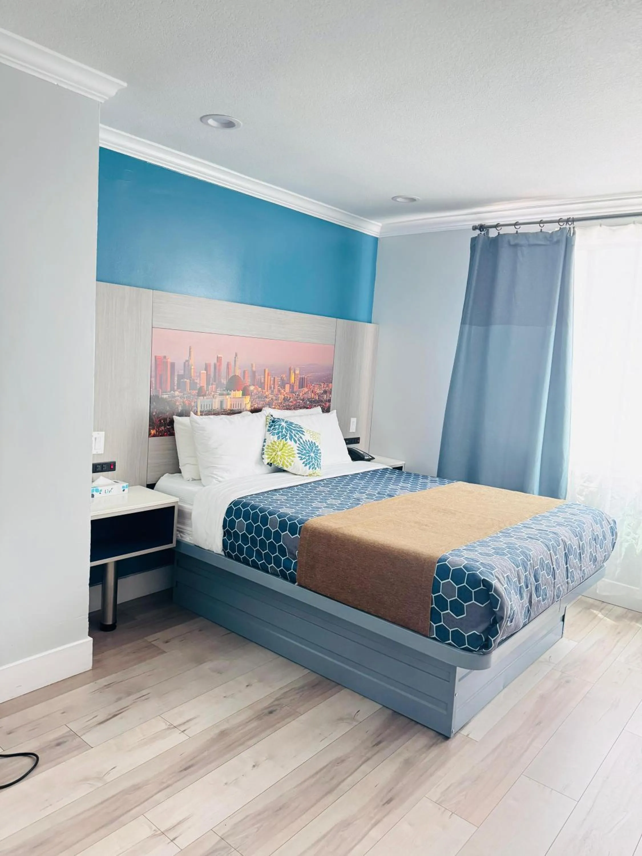 Bed in Hometel Suites