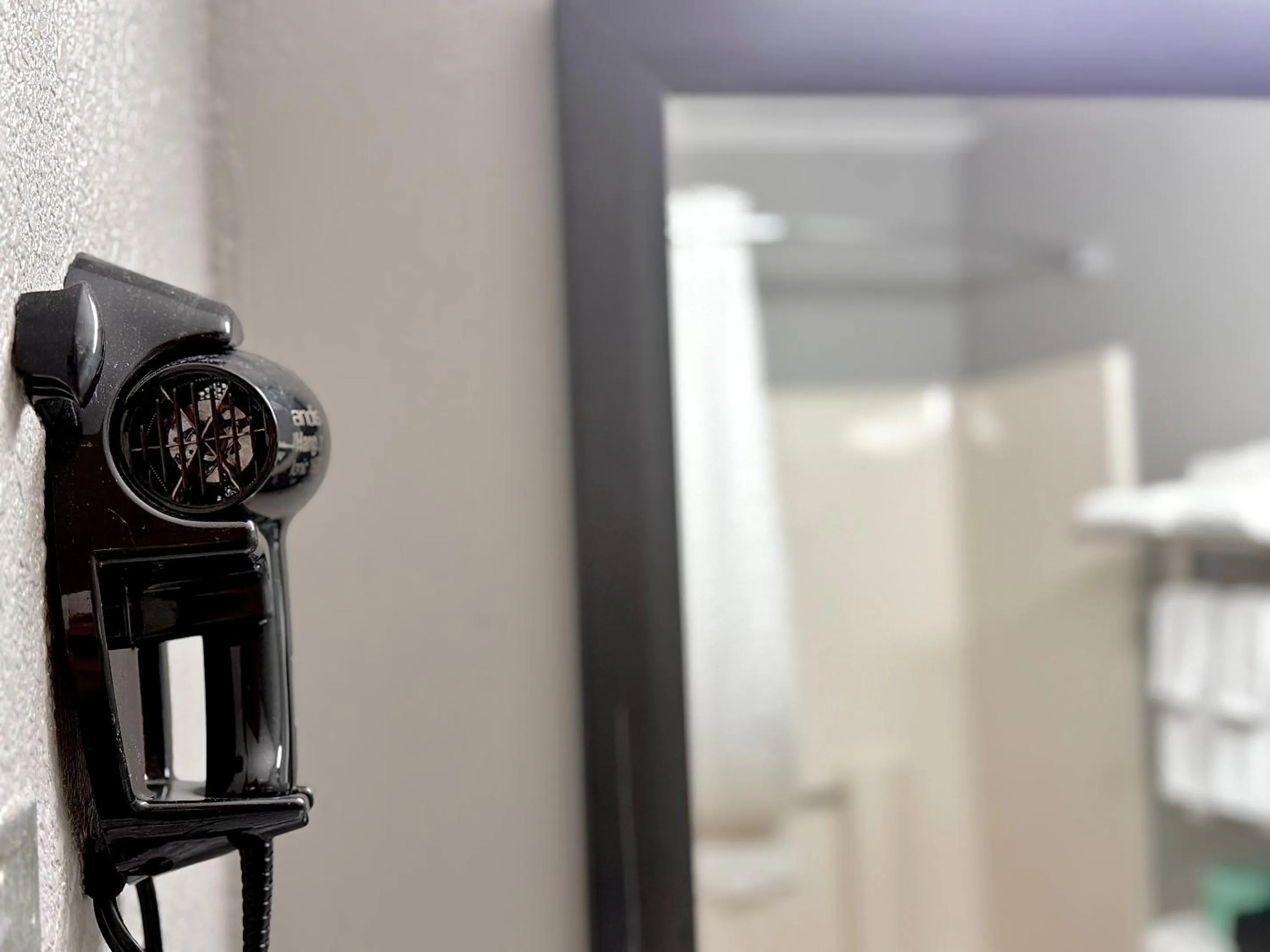 Bathroom in American Inn Cedar Rapids South