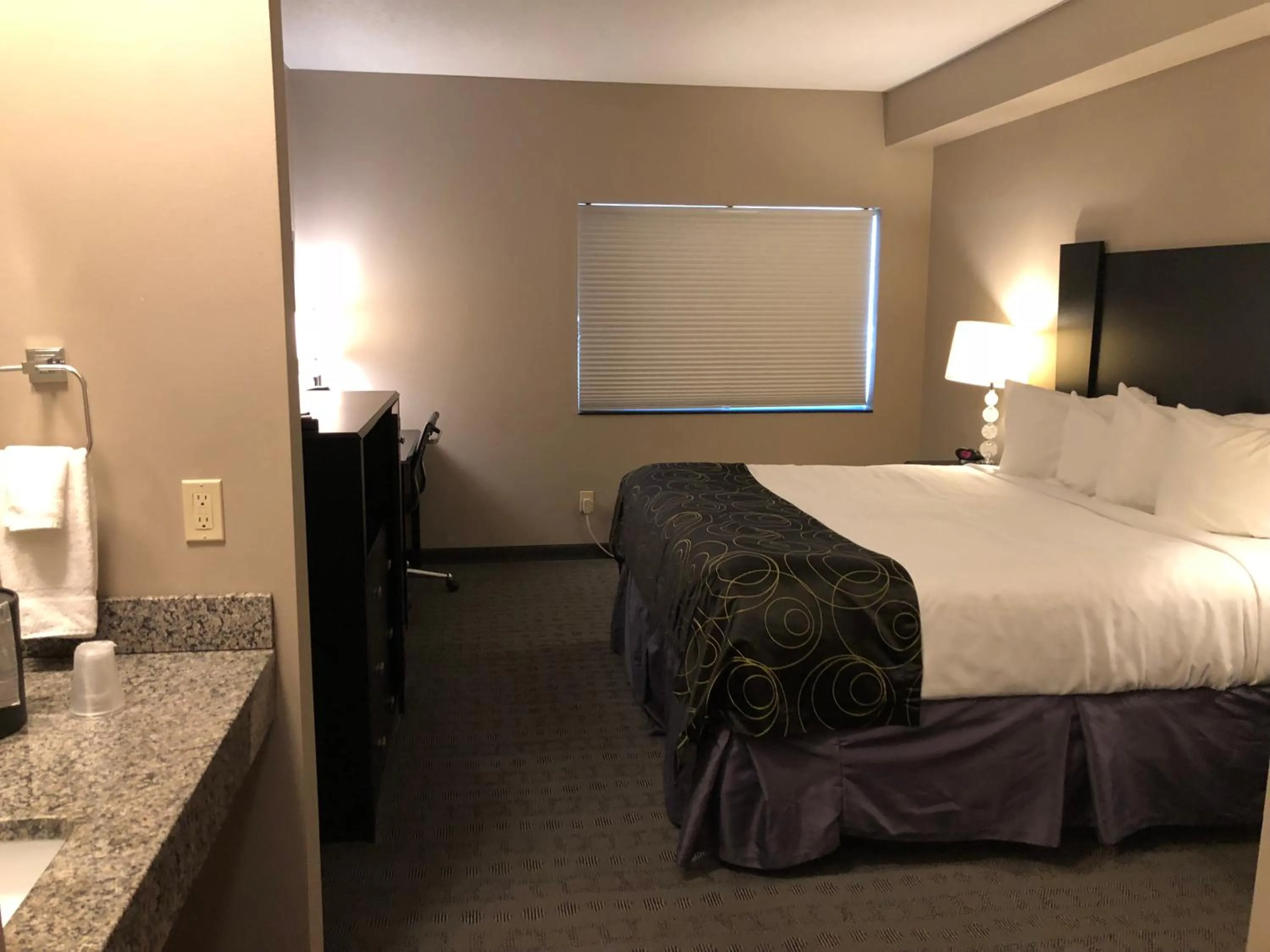 Bed in Okoboji Inn & Suites