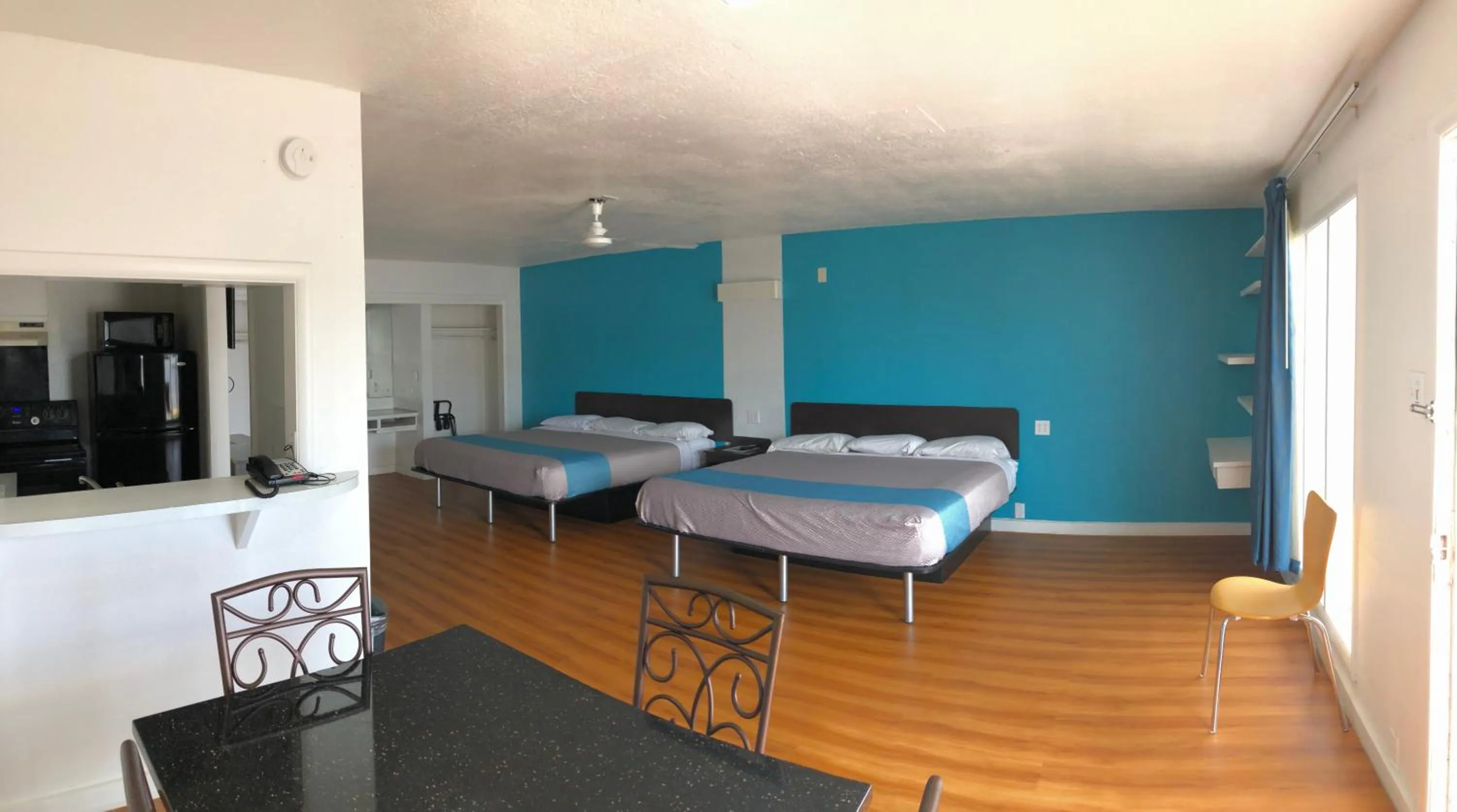 Bed in Trade Wind Motel