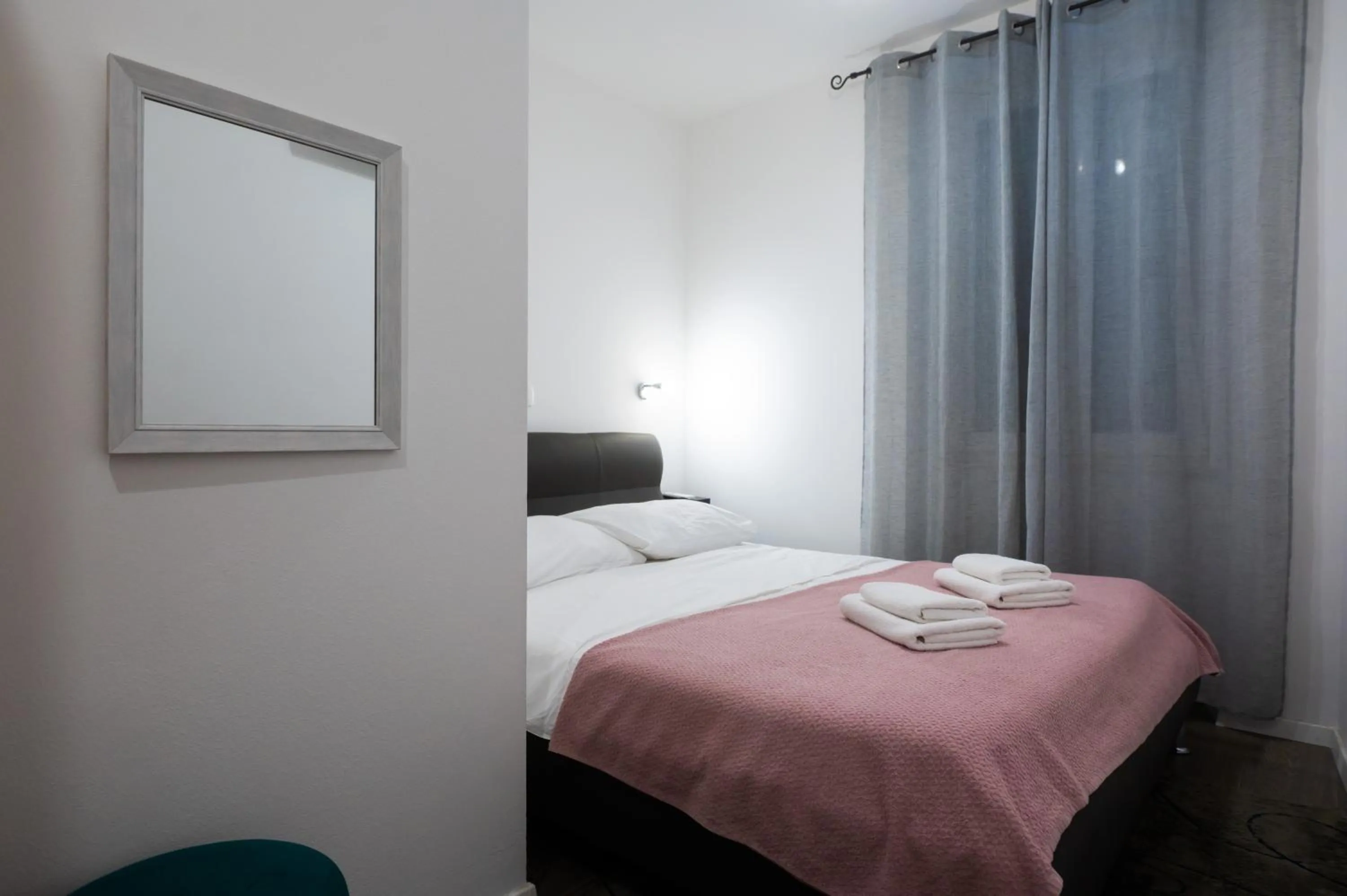 Bed in Pyrotima Apartments