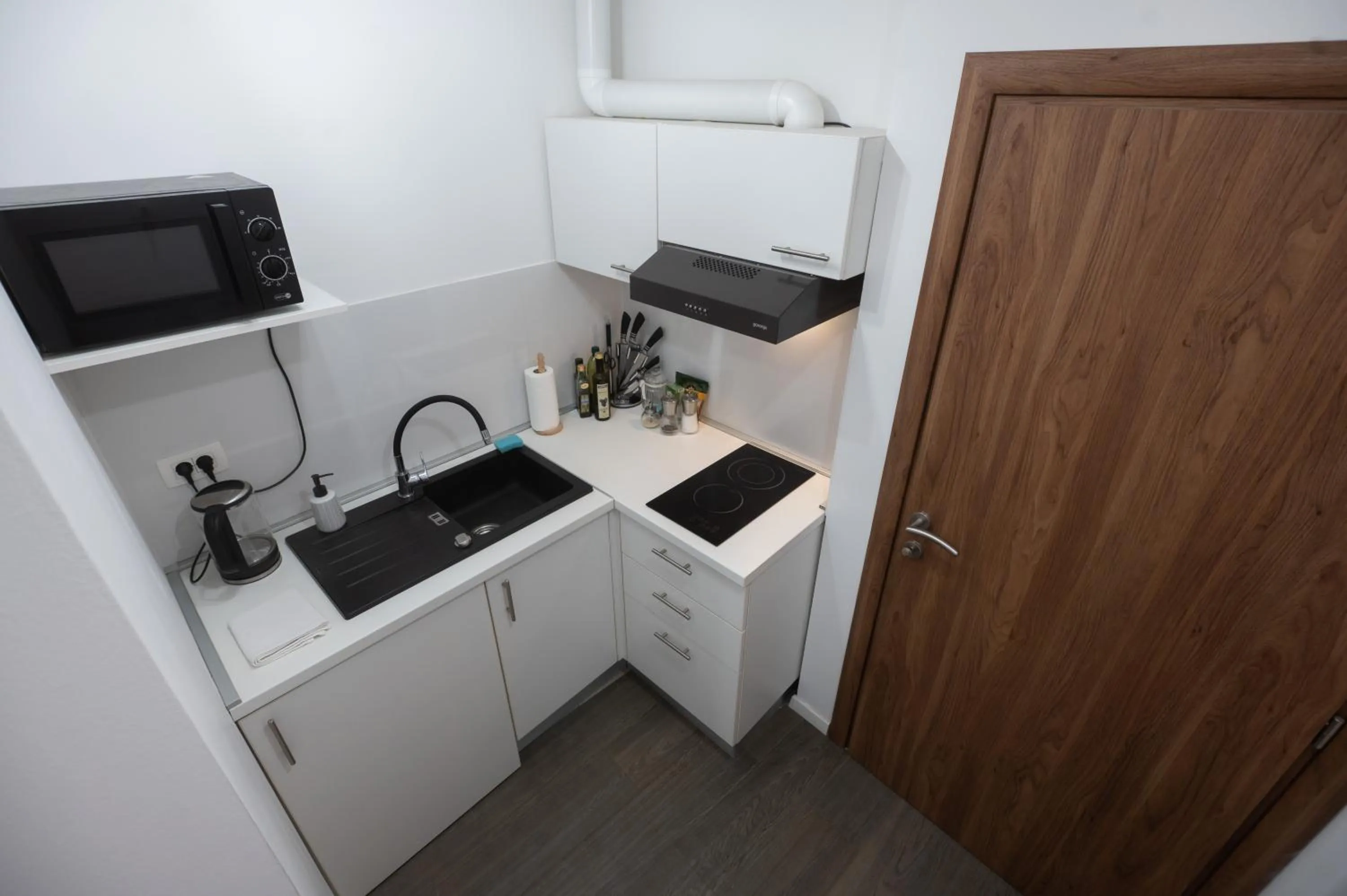 Kitchen or kitchenette in Pyrotima Apartments