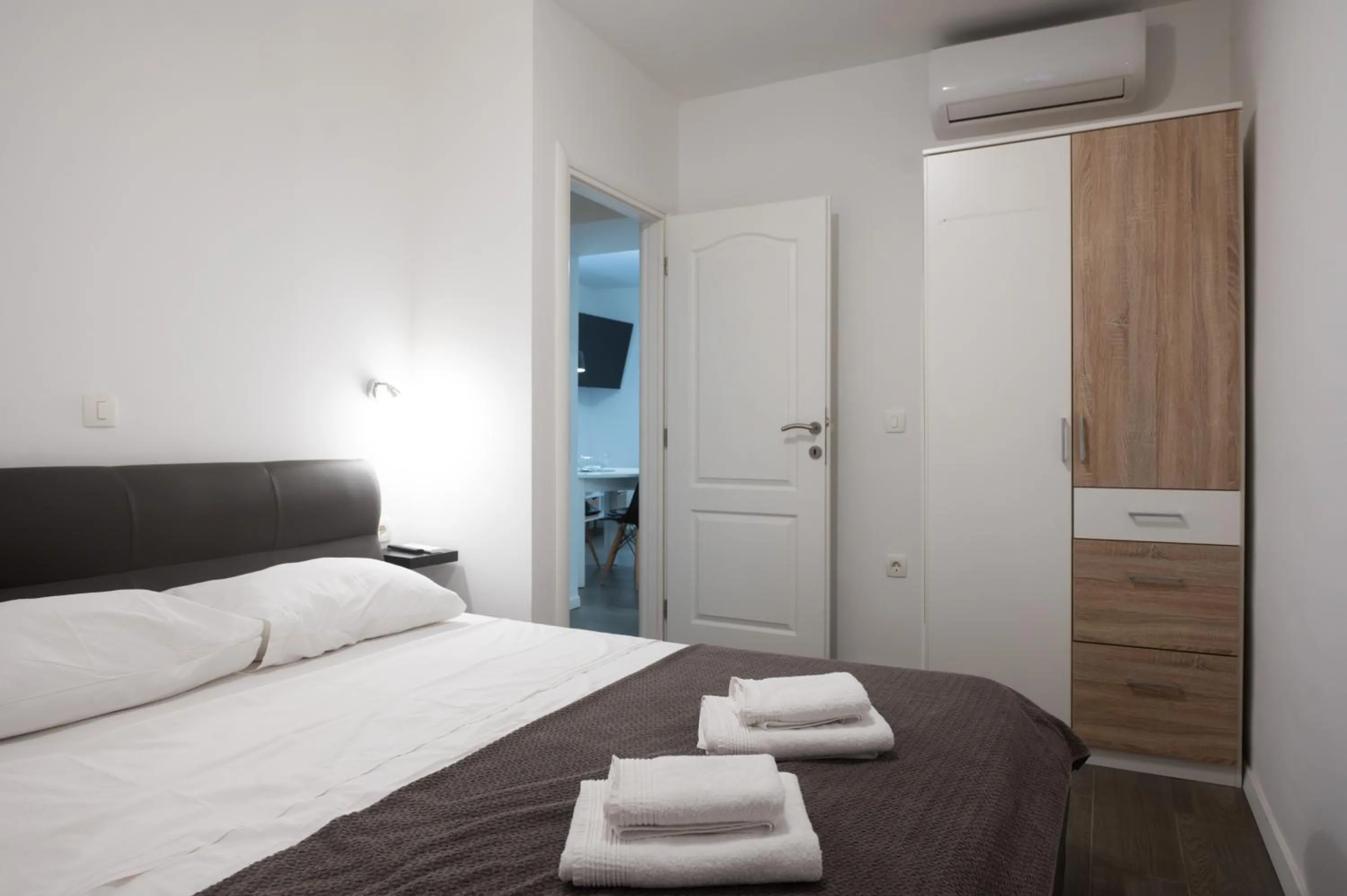 Bed in Pyrotima Apartments