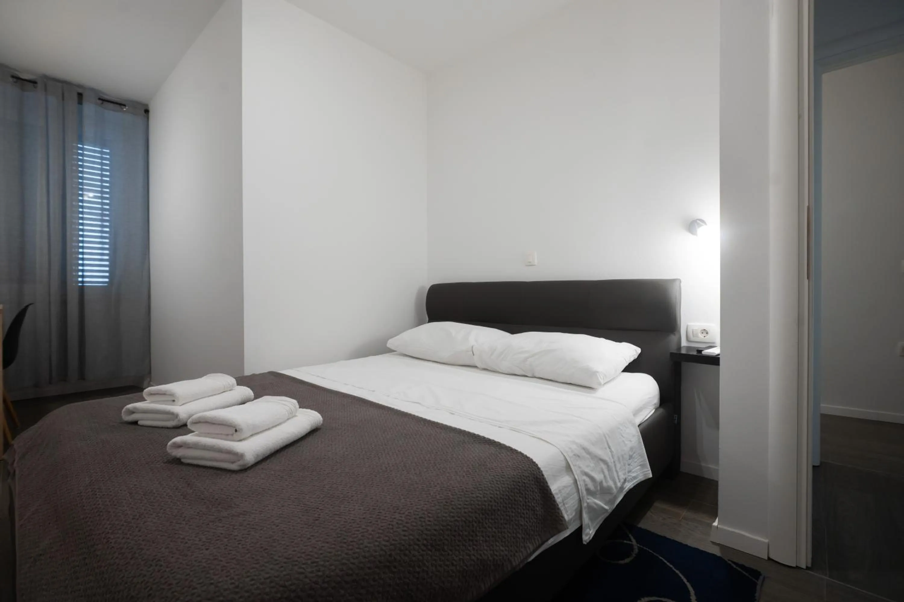 Bed in Pyrotima Apartments