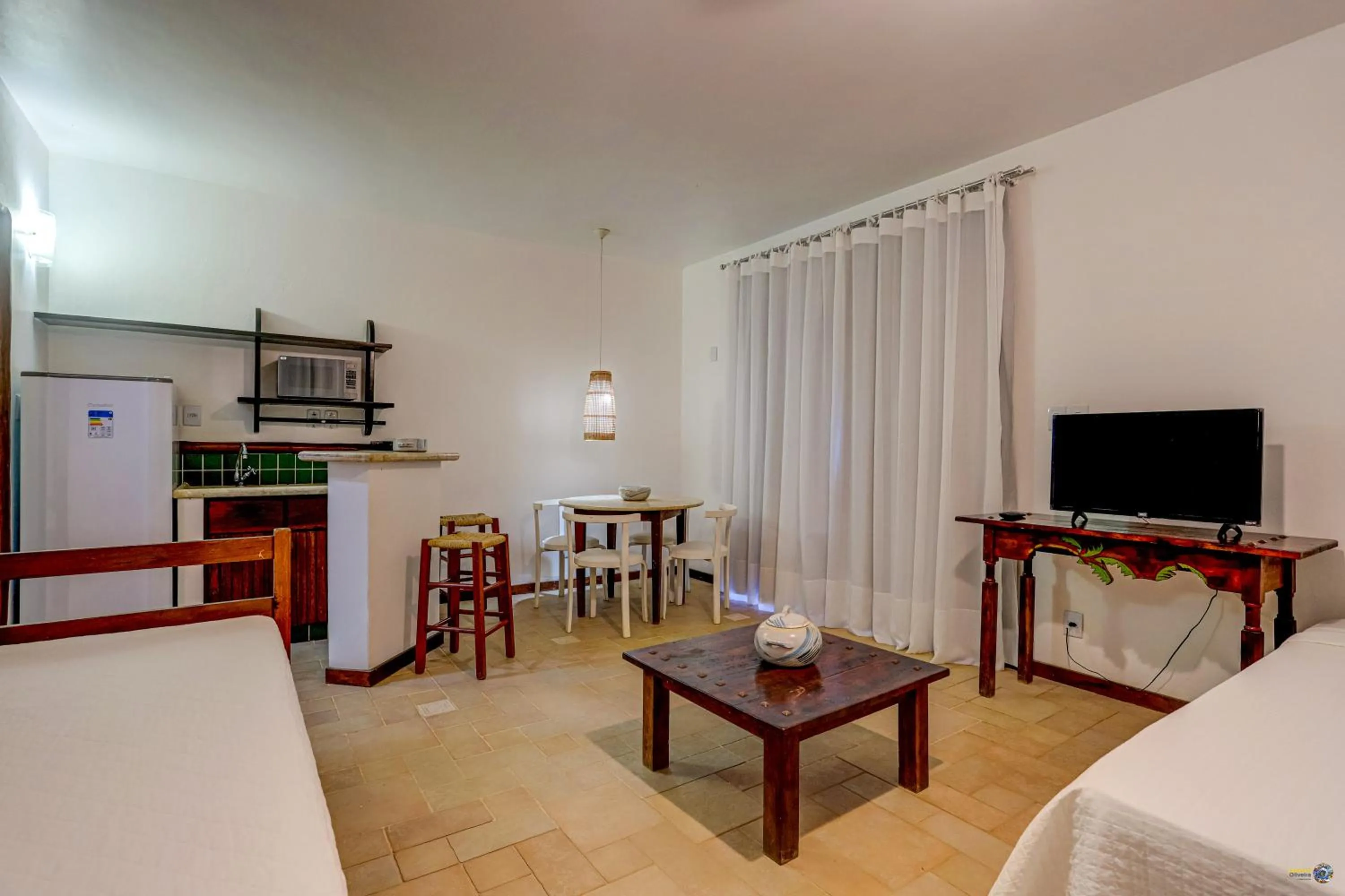 Communal lounge/ TV room in São José Beach Club & Hotel