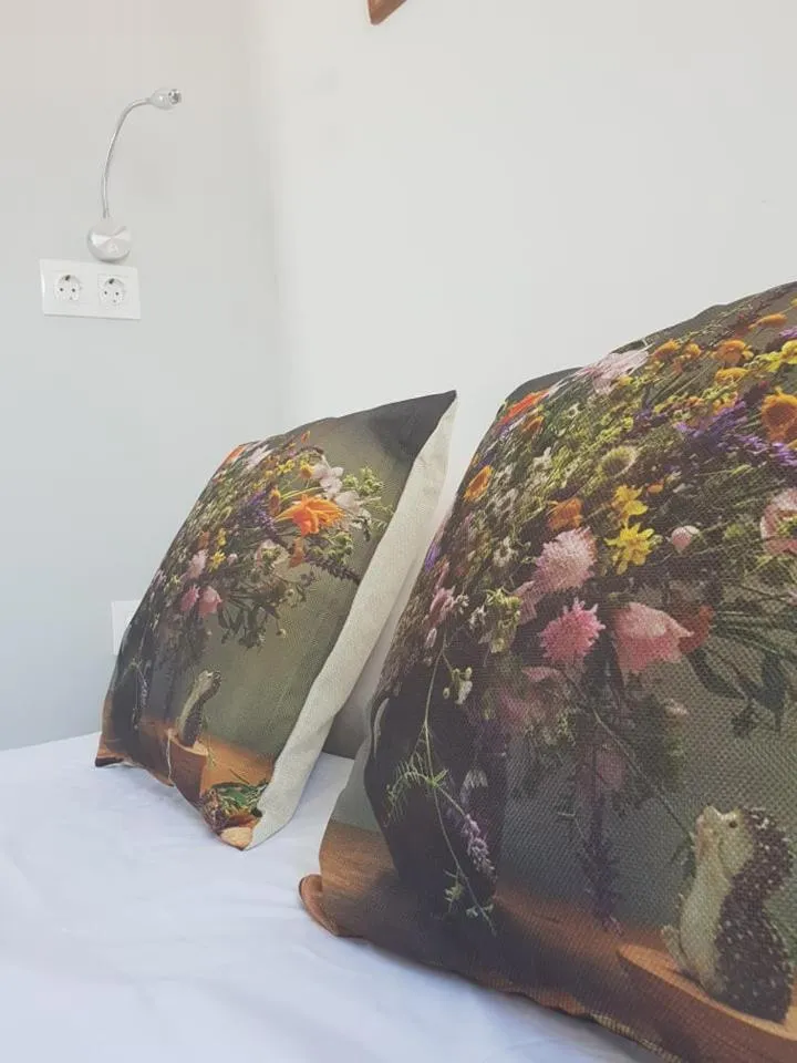 Bed in Aphrodite Art Hotel Aegina