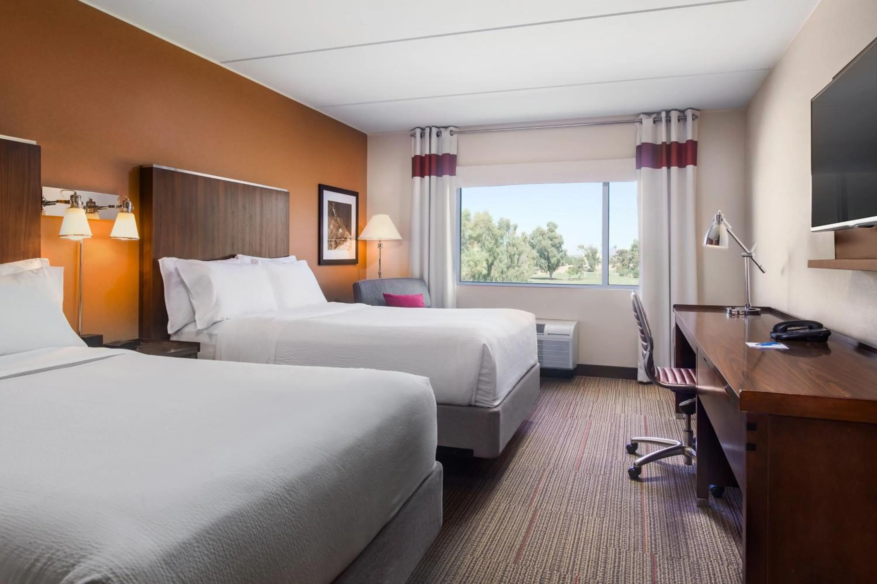 Photo of the whole room, Bed in Four Points by Sheraton at Phoenix Mesa Gateway Airport