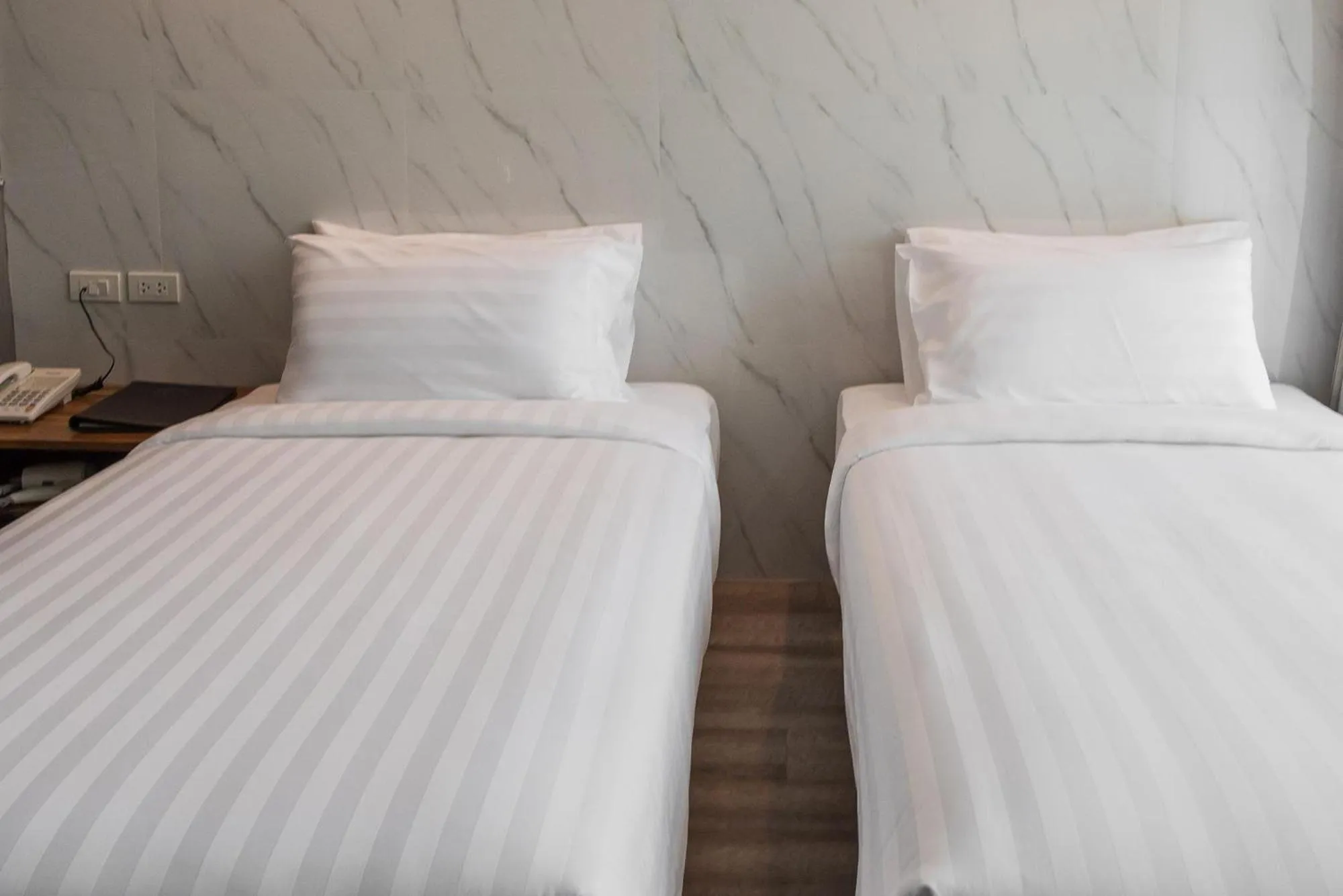 Bed in Bangkok City Link Hotel