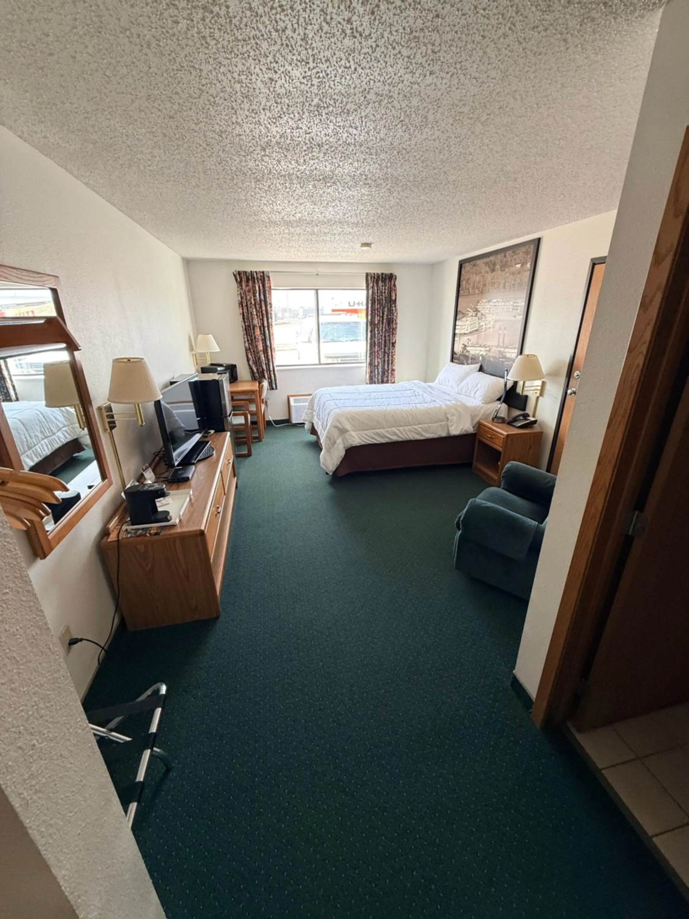 Bed in Budget inn & Suites