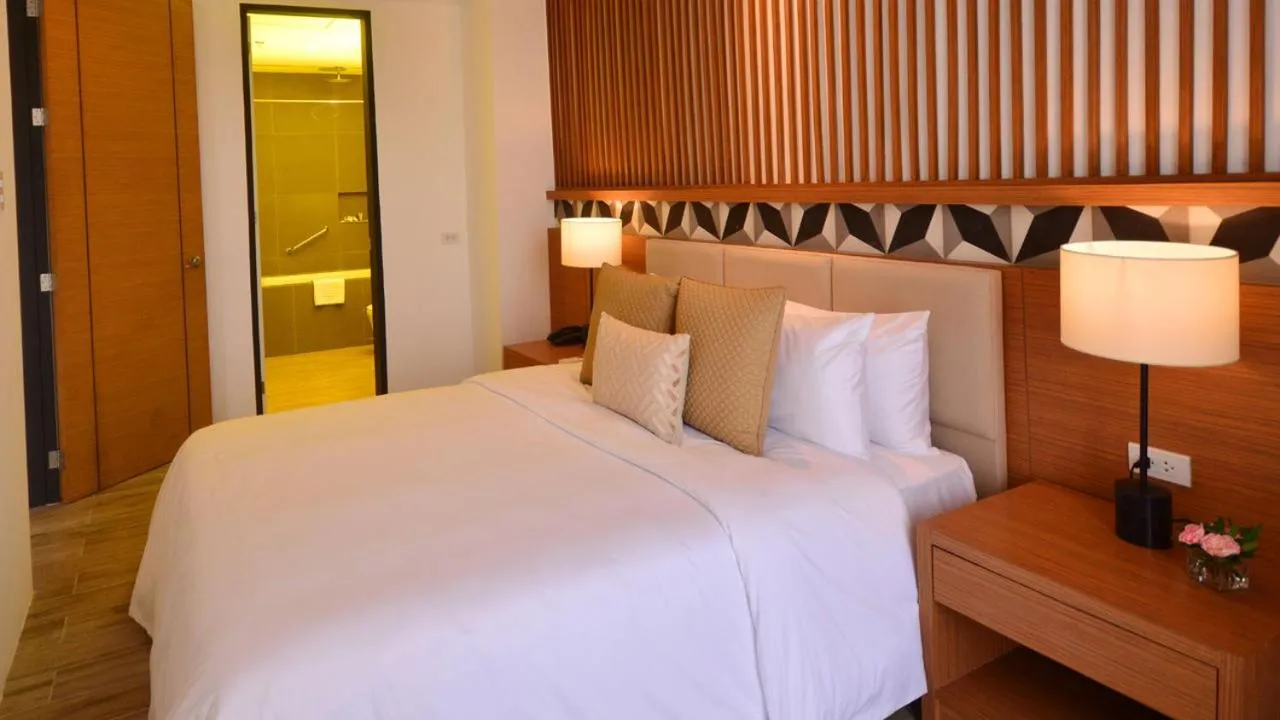 Bedroom, Bed in Crown Hotel at Harbour Springs Palawan Managed by Enderun Hotels