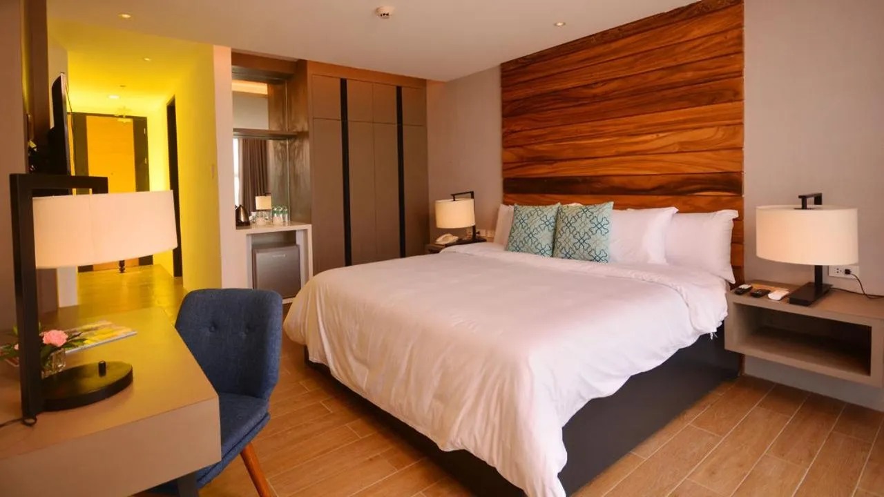 Bedroom, Bed in Crown Hotel at Harbour Springs Palawan Managed by Enderun Hotels