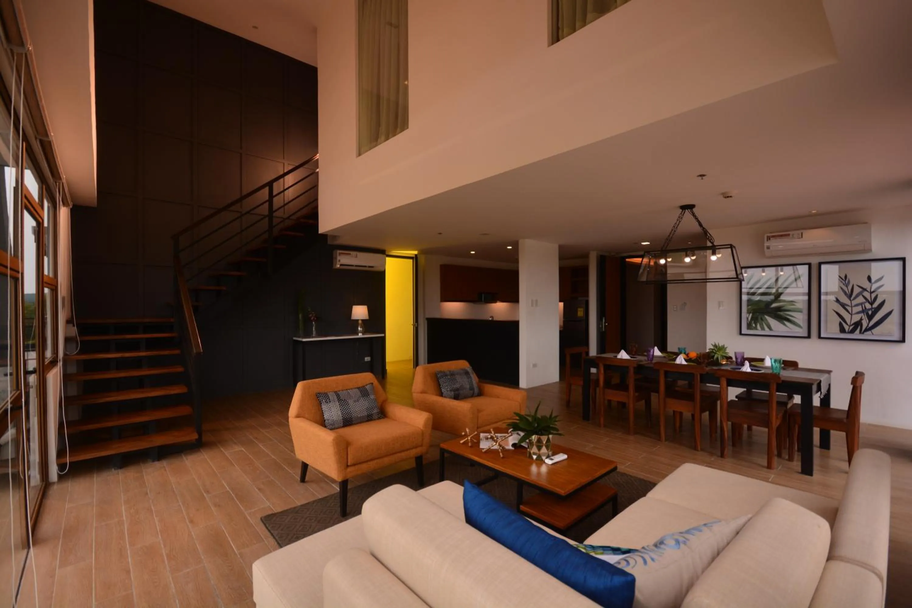 Living room in Crown Hotel at Harbour Springs Palawan Managed by Enderun Hotels