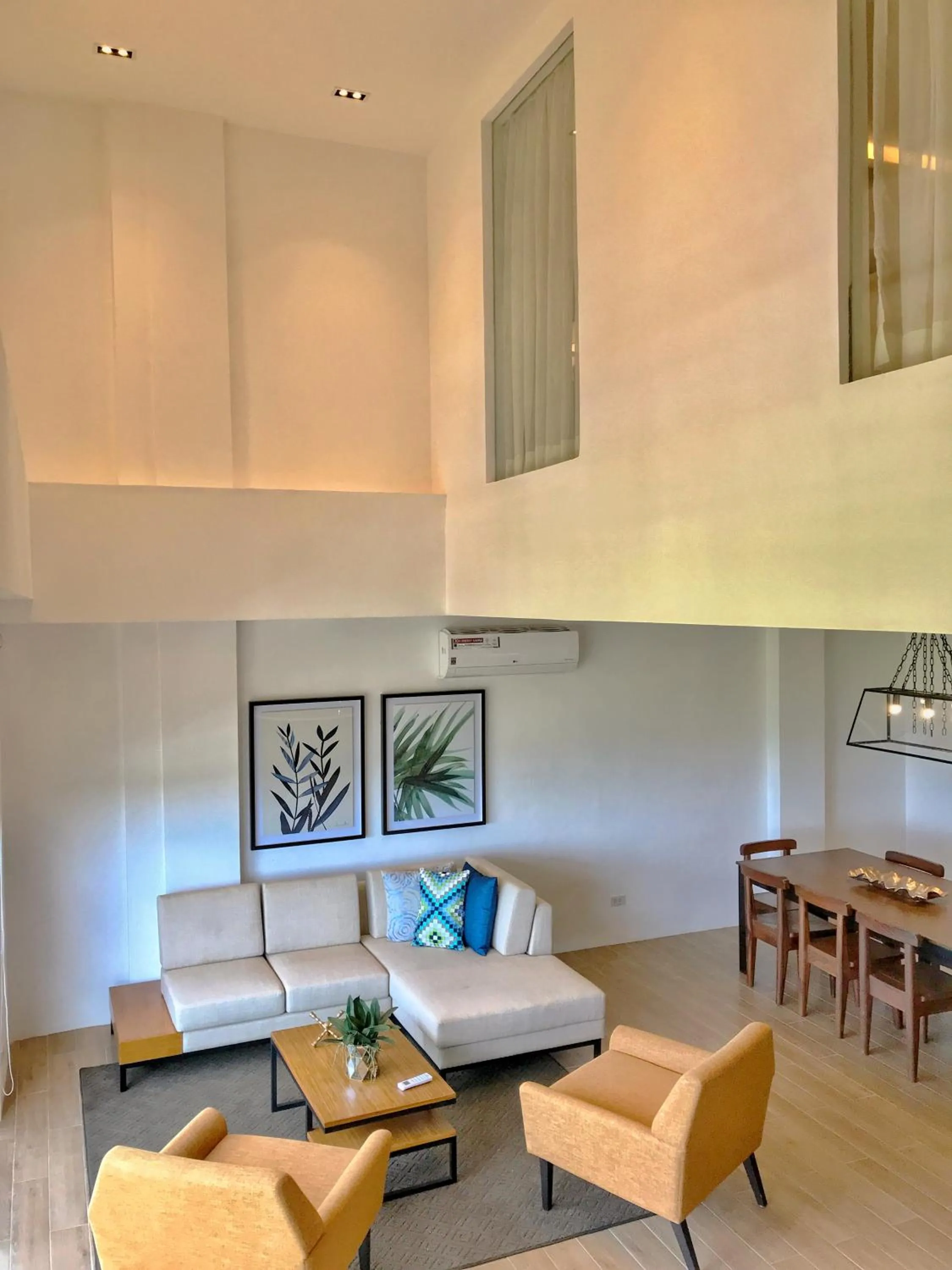 Living room in Crown Hotel at Harbour Springs Palawan Managed by Enderun Hotels