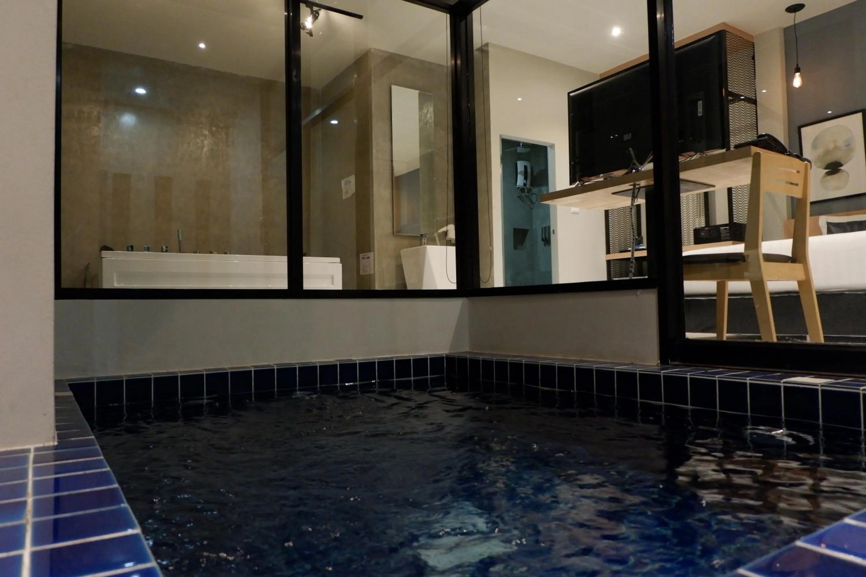 Swimming pool in Chill D Resort Buriram