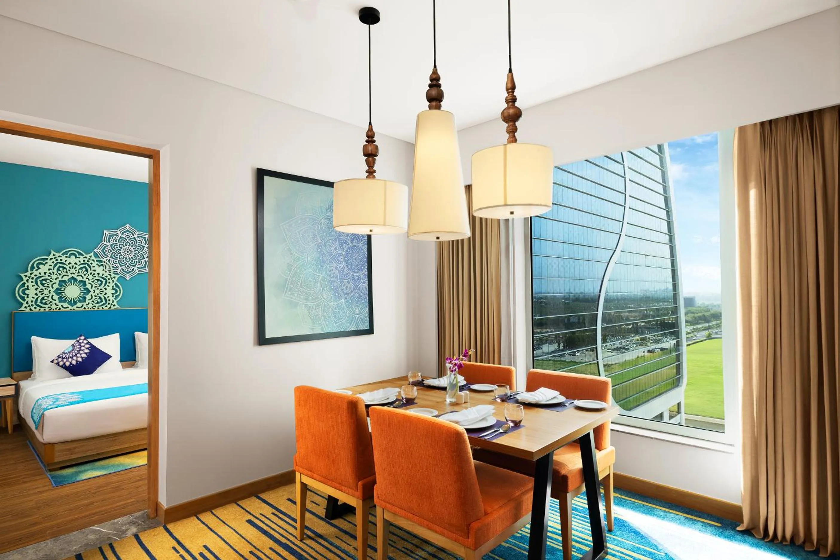 Dining area, Bed in Grand Mercure Ahmedabad GIFT City - An Accor Hotels Brand