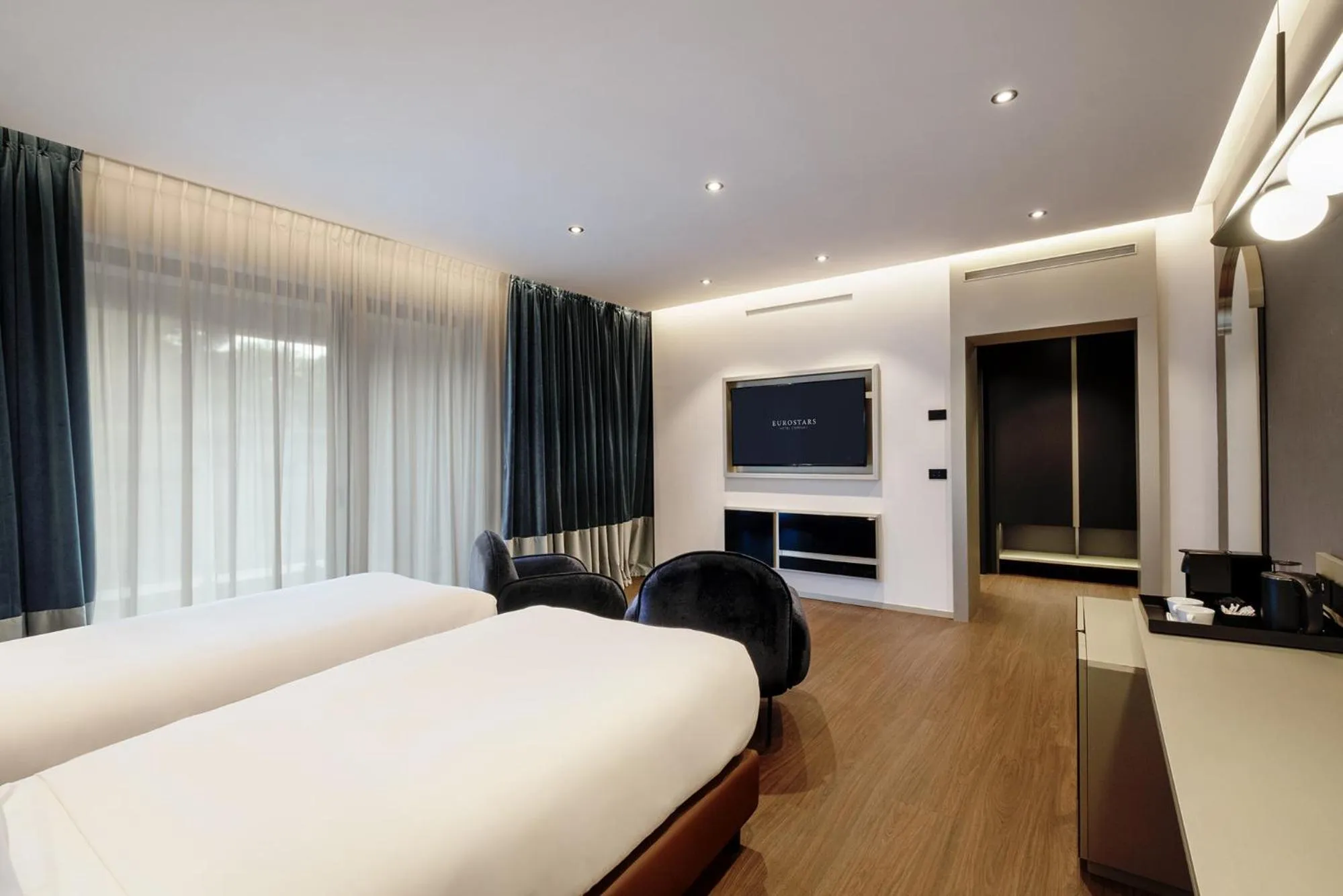 Bed in Eurostars Matera La Suite