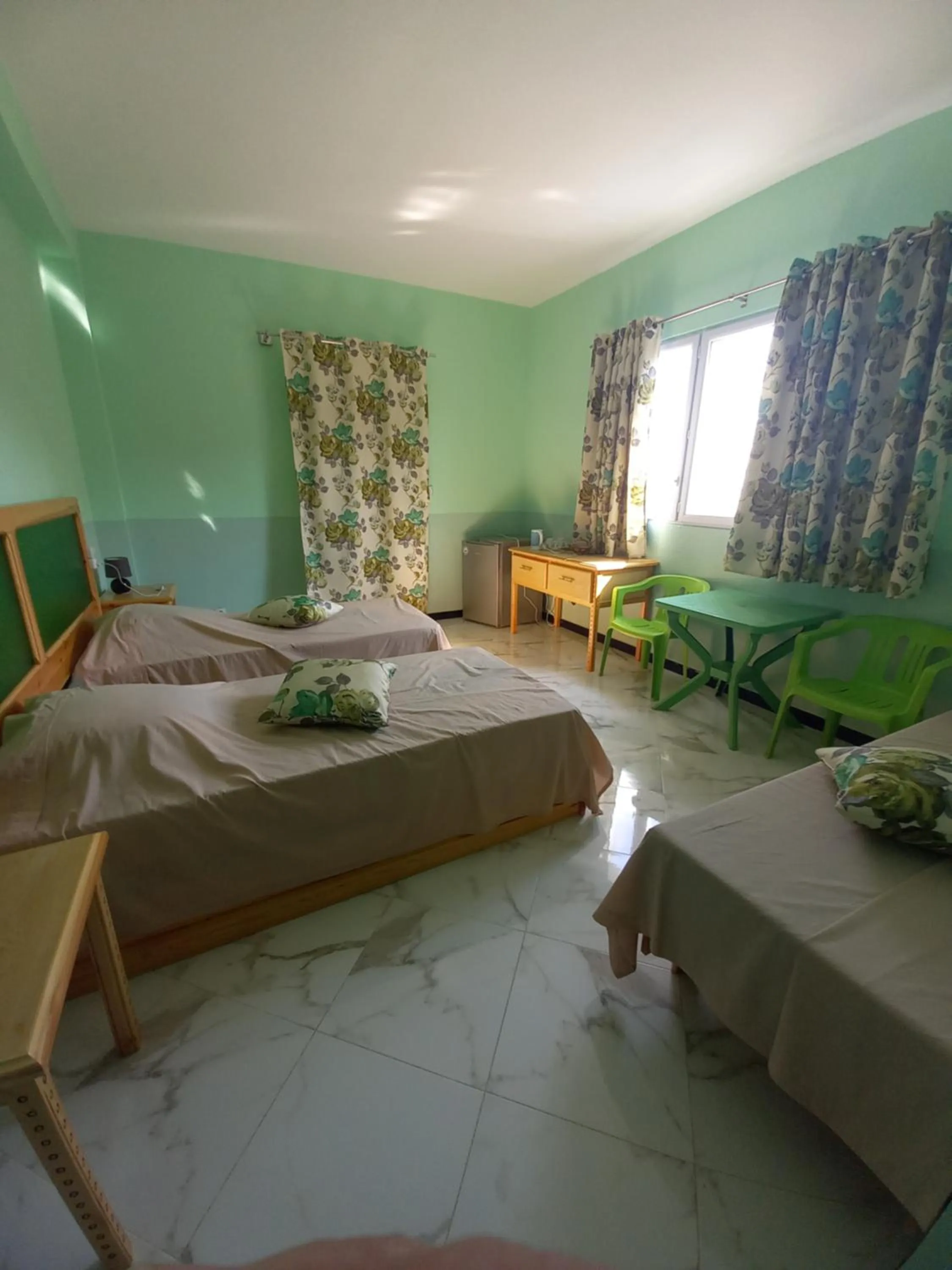 Bed in MAISON D’HÔTE LES TORTUES -