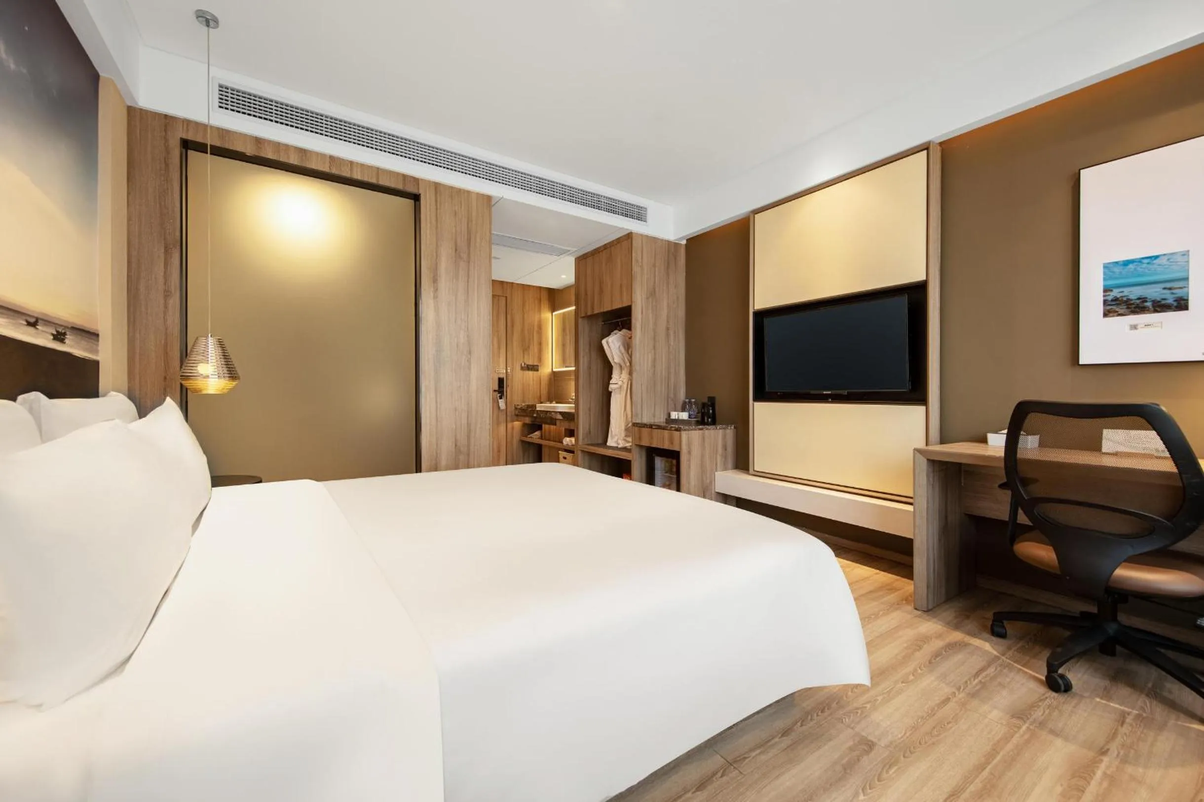 Bed in Atour Hotel High Speed Railway Station Maoming