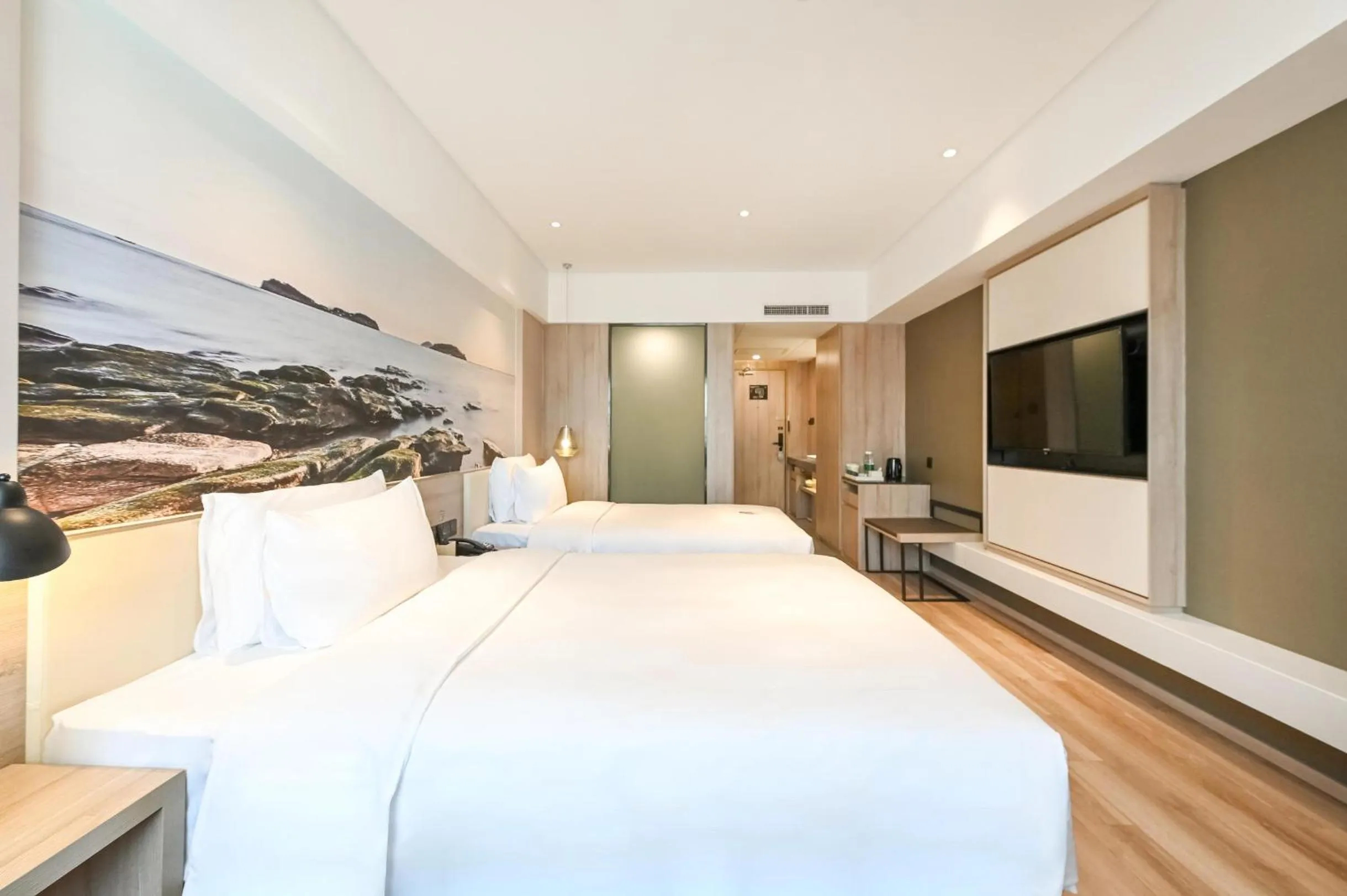 Bed in Atour Hotel Railway Station Dalian