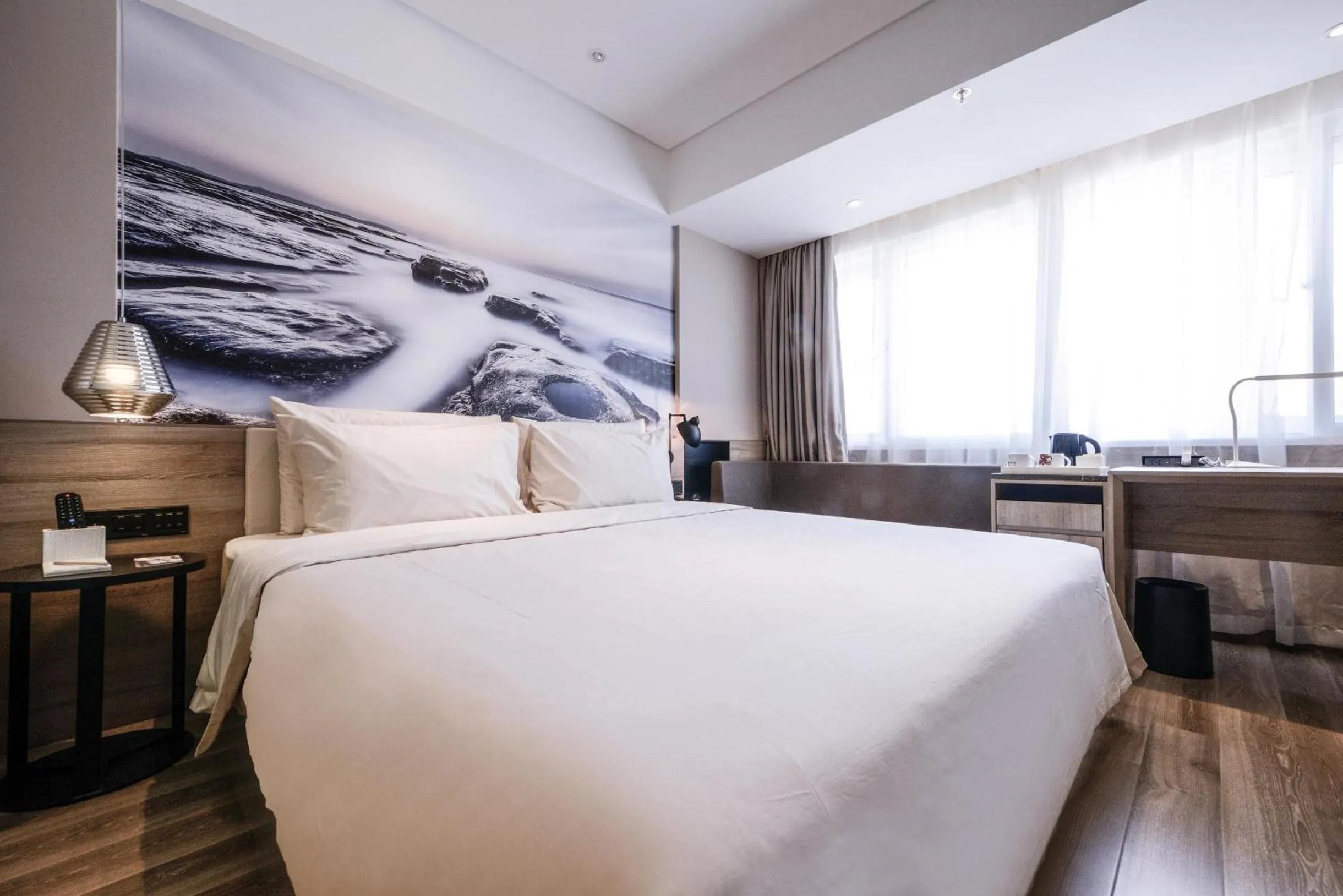 Bed in Atour Hotel Railway Station Dalian