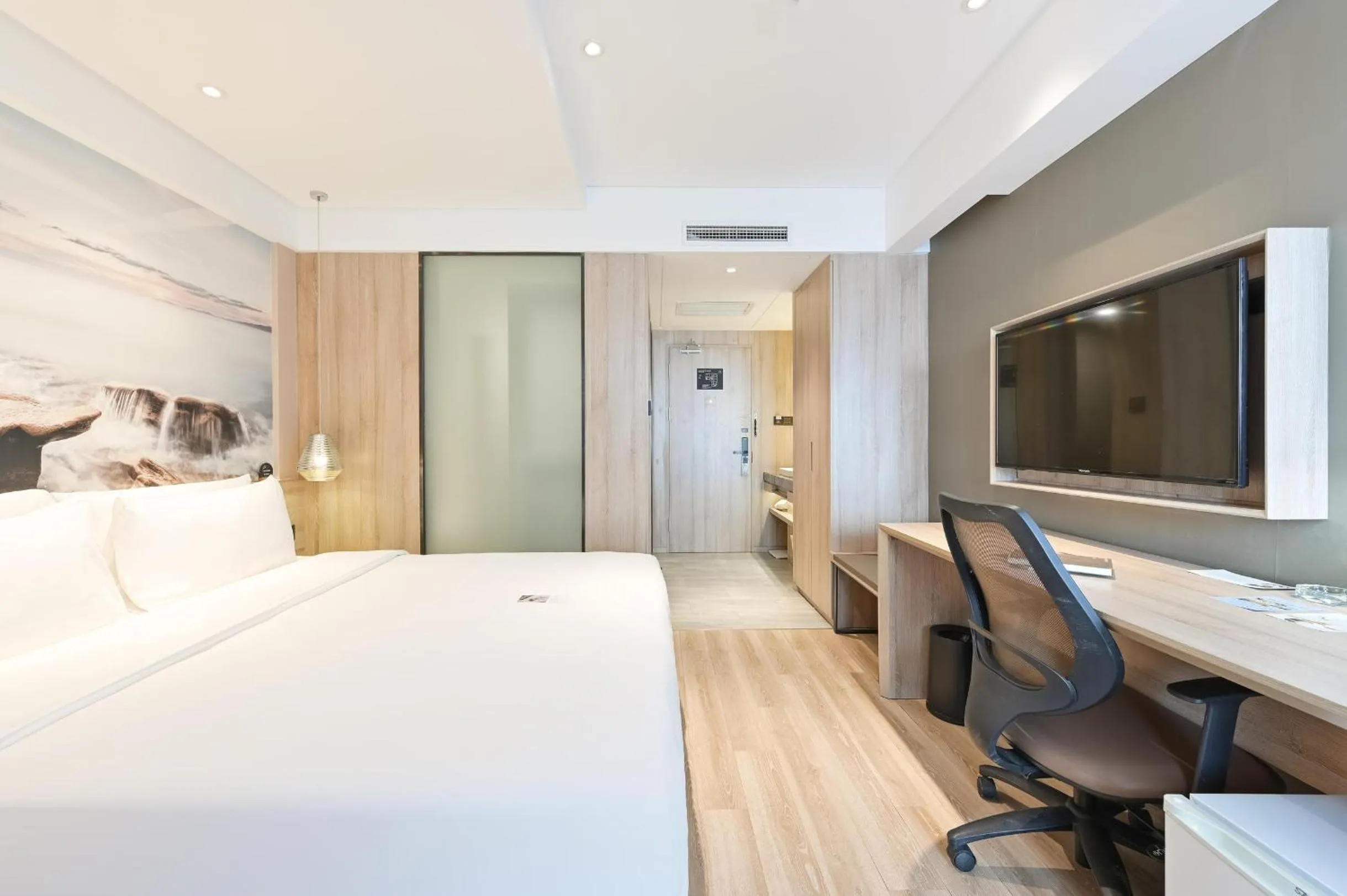 Bed in Atour Hotel Railway Station Dalian